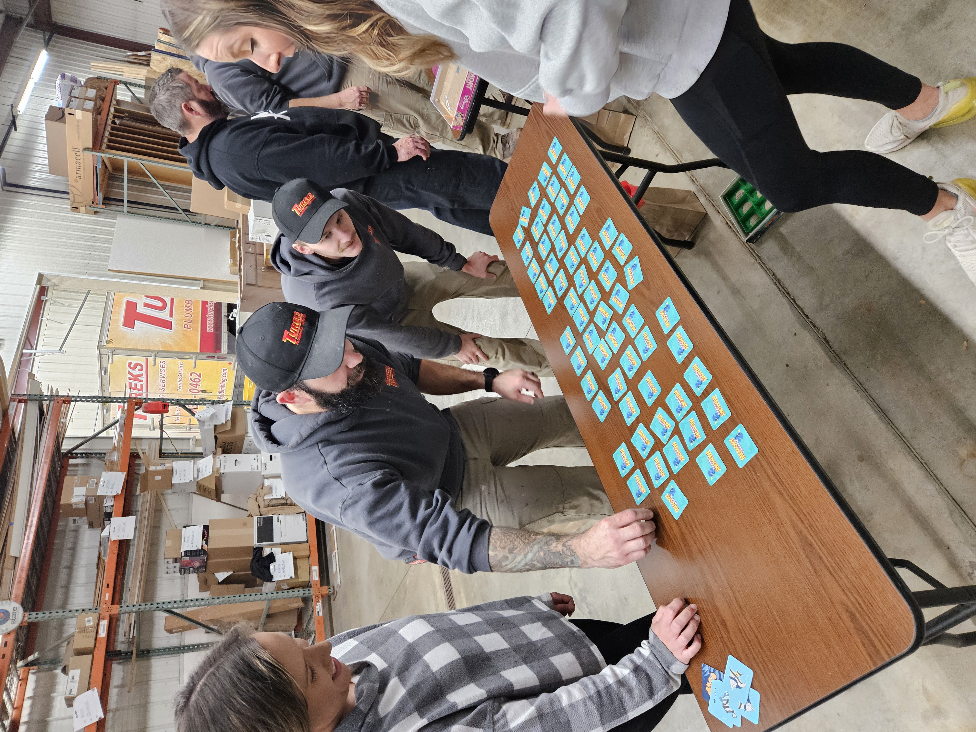 Building teamwork and professionalism inside Tureks Plumbing Services' operational hub.