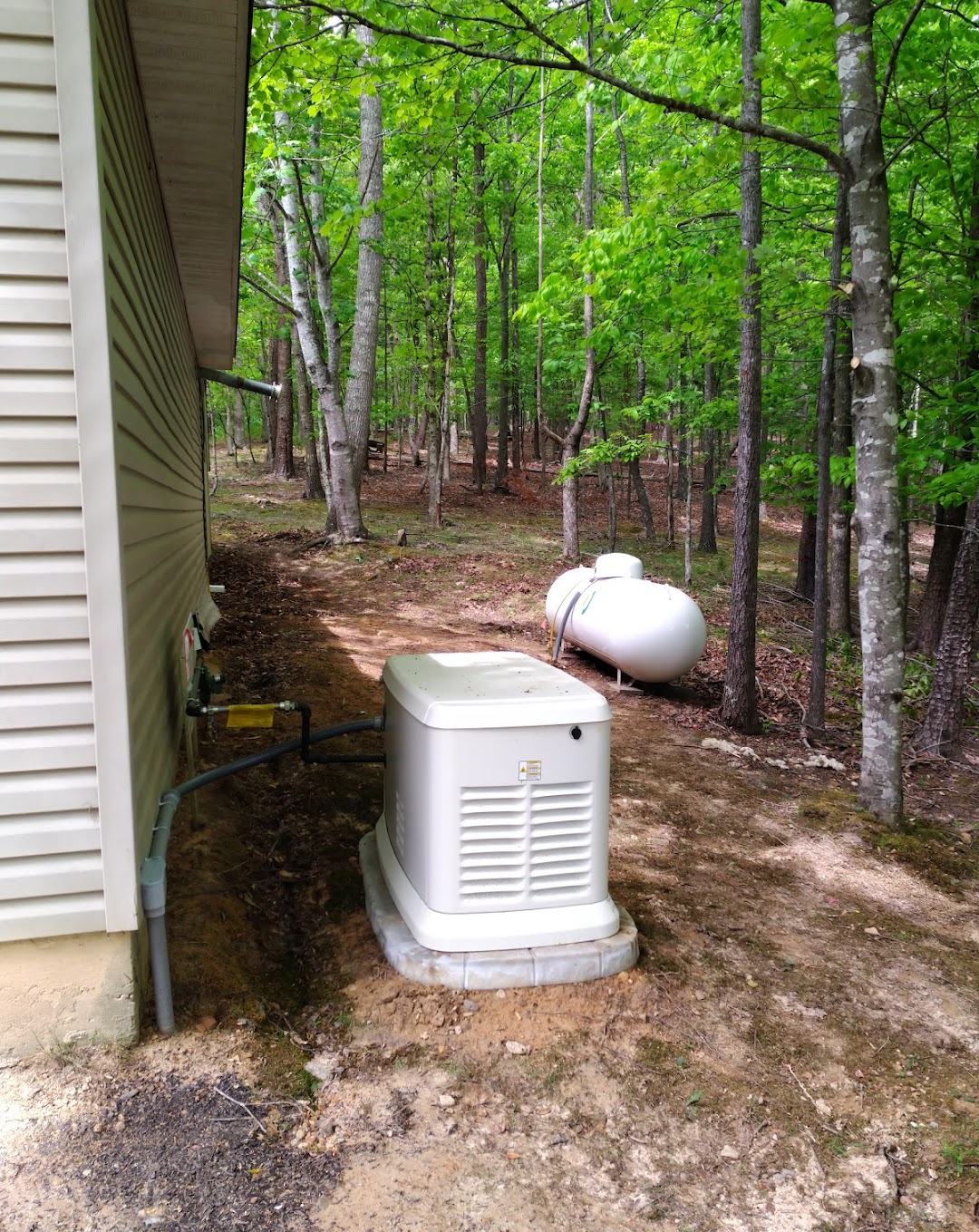 Reliable power solutions for your home amidst nature, expertly installed by Bob Garrett Services.