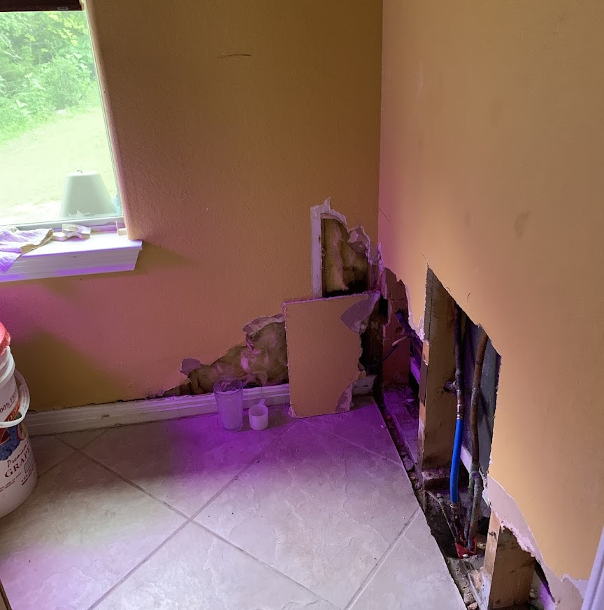 Abacus Plumbing, Air Conditioning, & Electrical restored confidence with careful in-home plumbing repairs visible during a precise pipe access and repair.