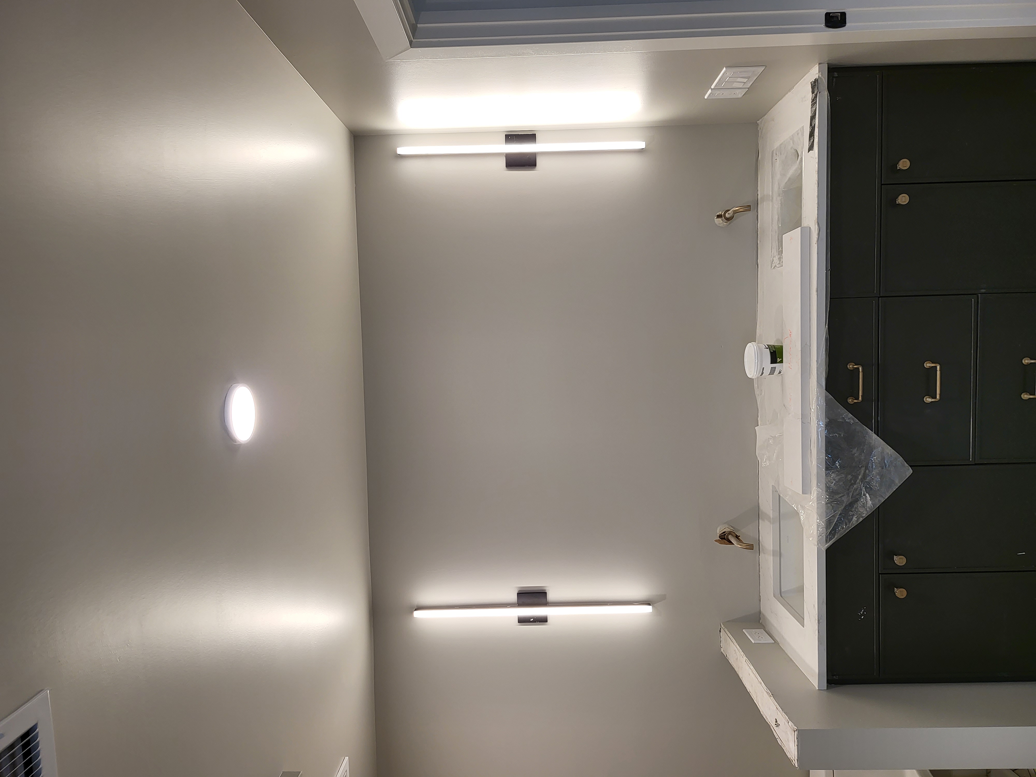 Transform your bathroom into a modern oasis with Next Level Pros' expert electrical installations. Experience elegance and quality!