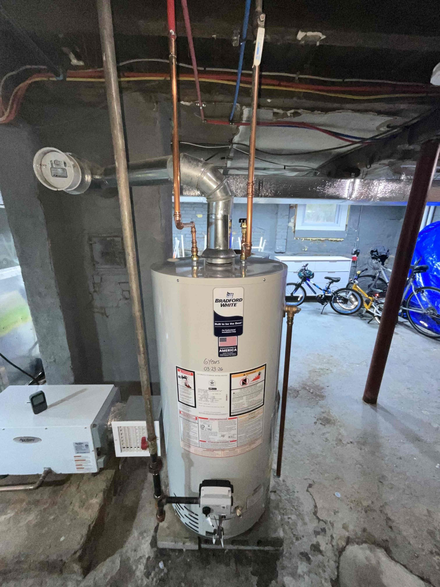 A professionally installed Bradford White water heater shows reliable craftsmanship and lasting value from Akian Plumbing, Heating, Cooling & Electric.
