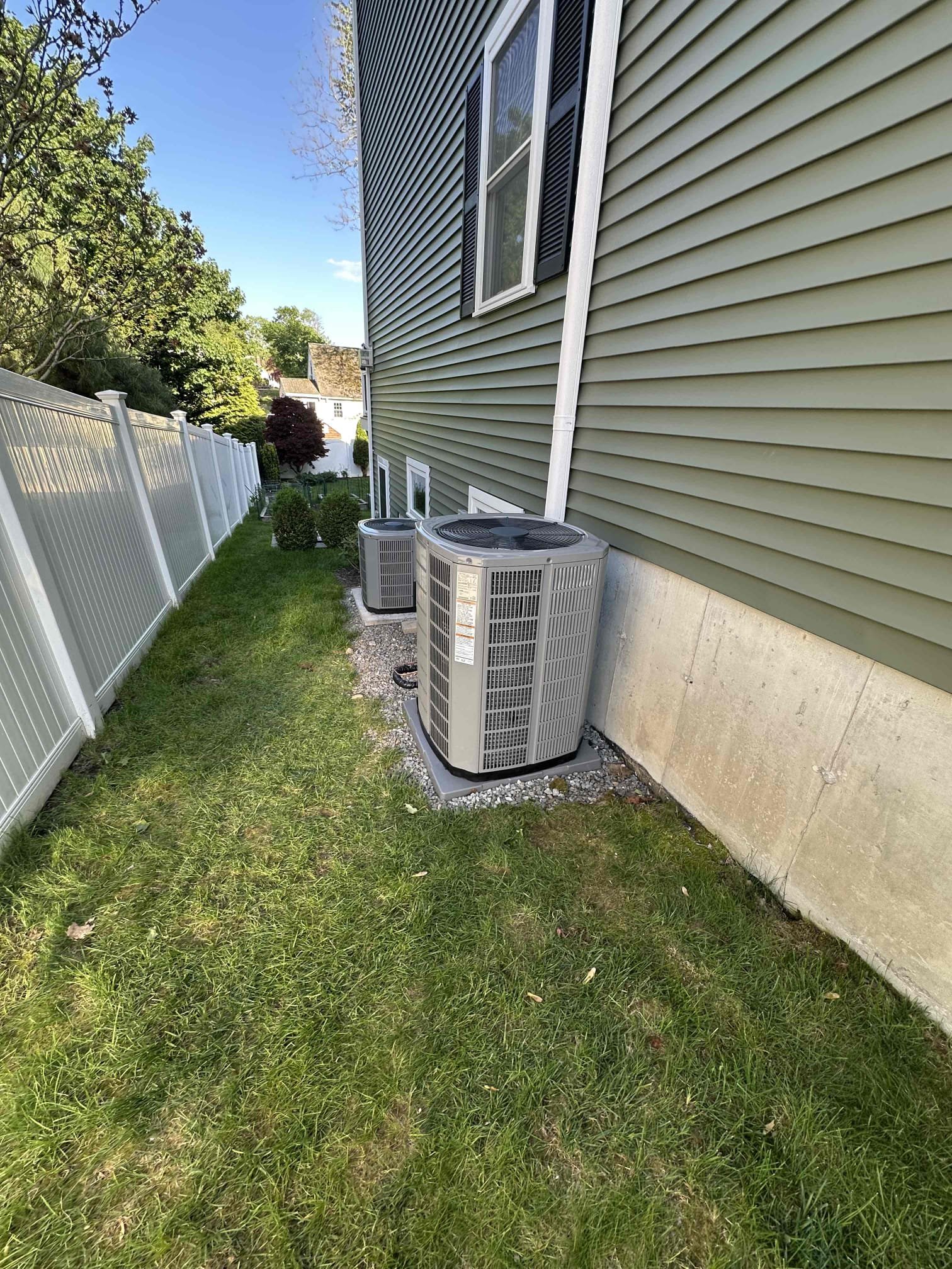 Homeowners trust Akian Plumbing, Heating, Cooling & Electric for neat, professional HVAC installations that protect equipment and preserve landscaping.