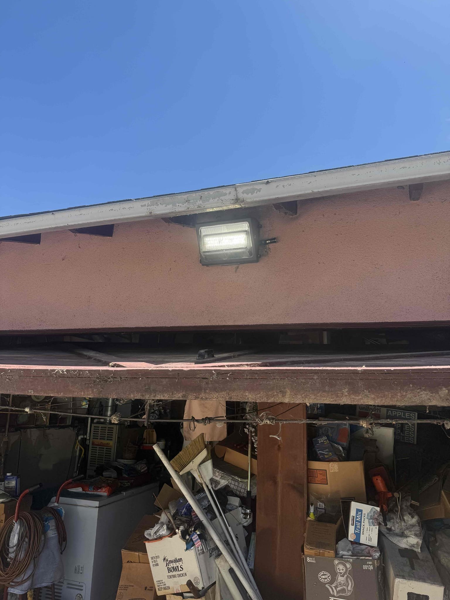 Powell Electric inspected and fixed outdoor lighting while noting necessary soffit maintenance to keep homes safe and well-lit.