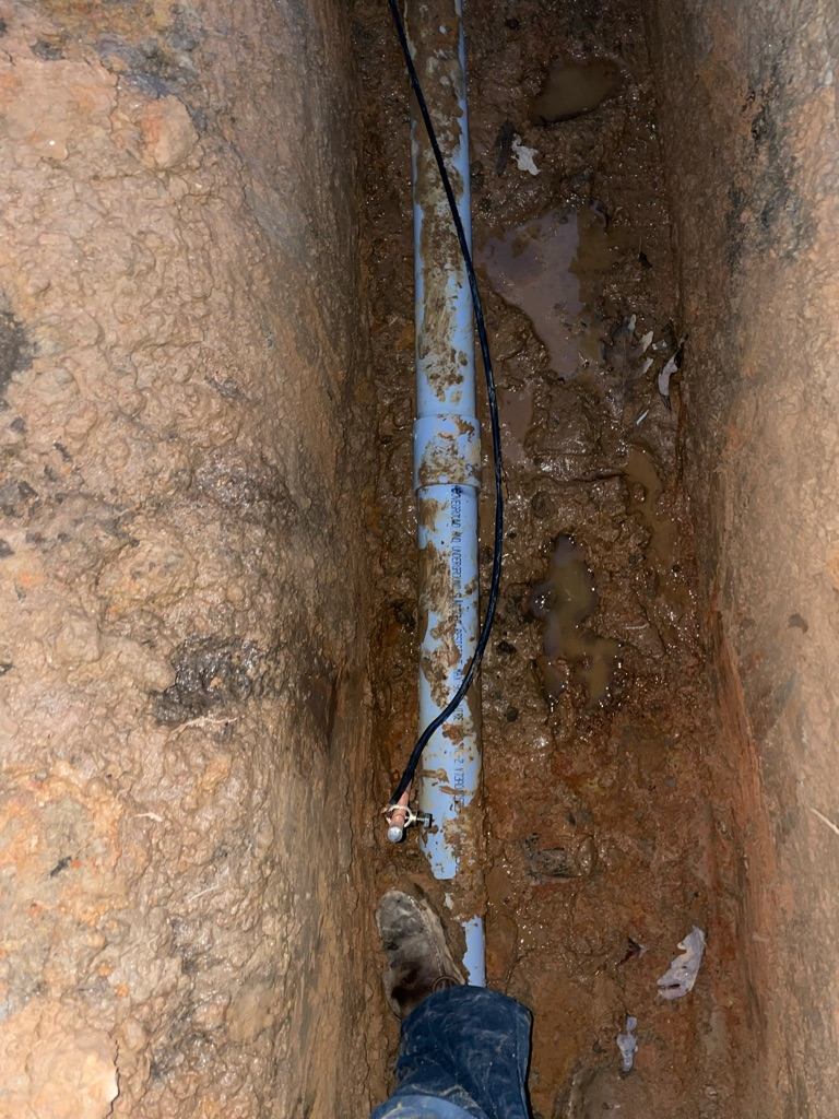 Aardvark Electric, Inc. showcasing skilled installation even under challenging conditions, ensuring quality and reliability.