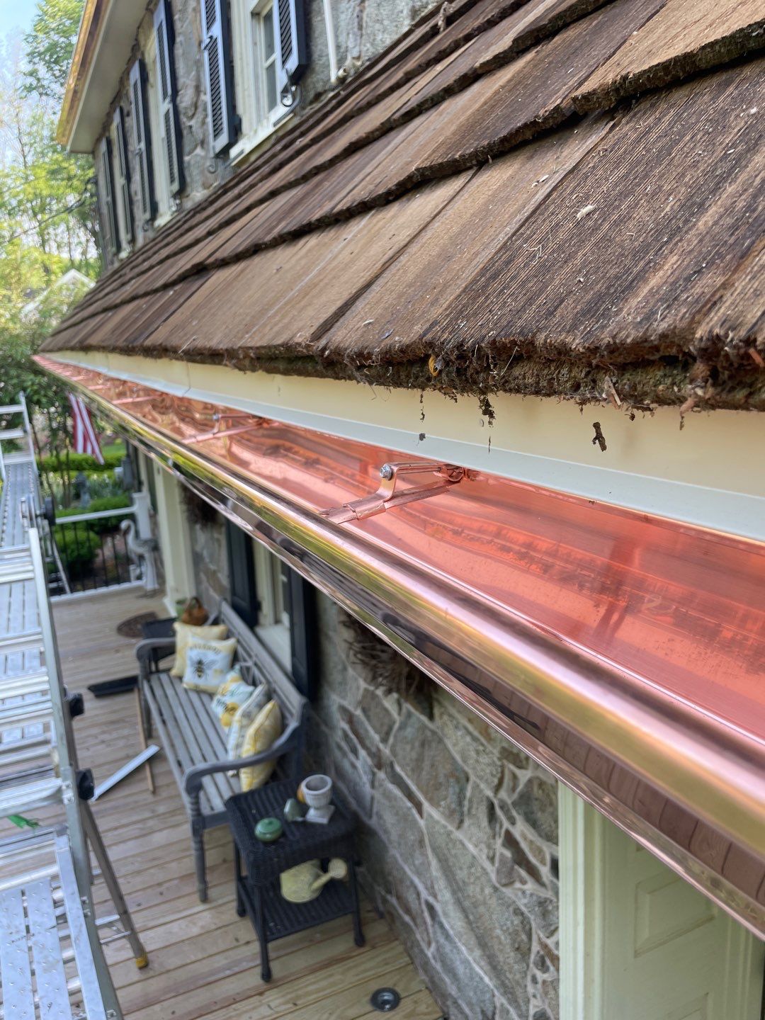 Enhance your home's curb appeal with expert copper gutter installations that promise lasting quality and style by Mast Roofing & Construction.