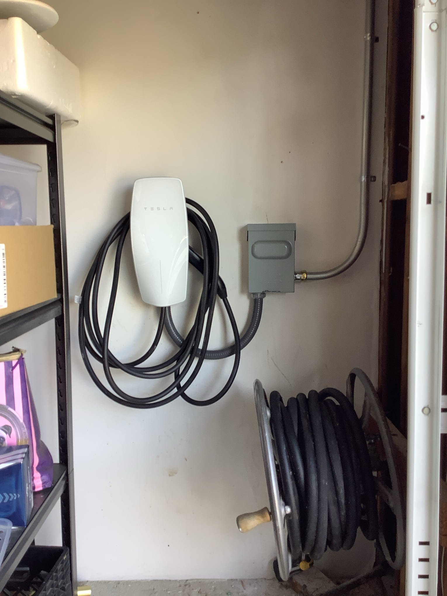 Powell Electric installed this clean, secure Tesla charging station to deliver reliable at-home charging and peace of mind.