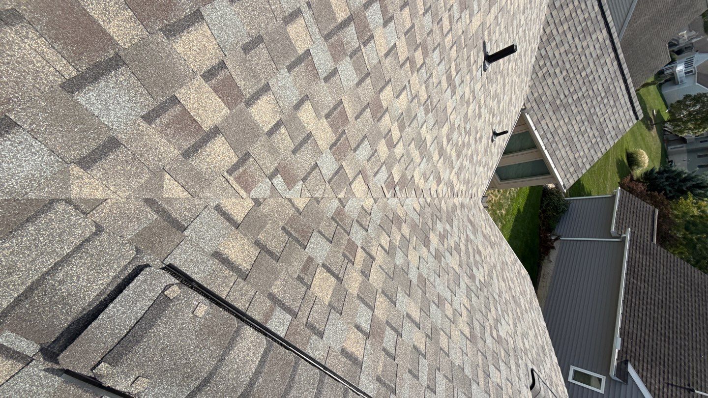 Showcasing reliable craftsmanship and lasting protection, Mosaic Roofing & Exteriors delivers a neatly installed shingle roof with quality ventilation.