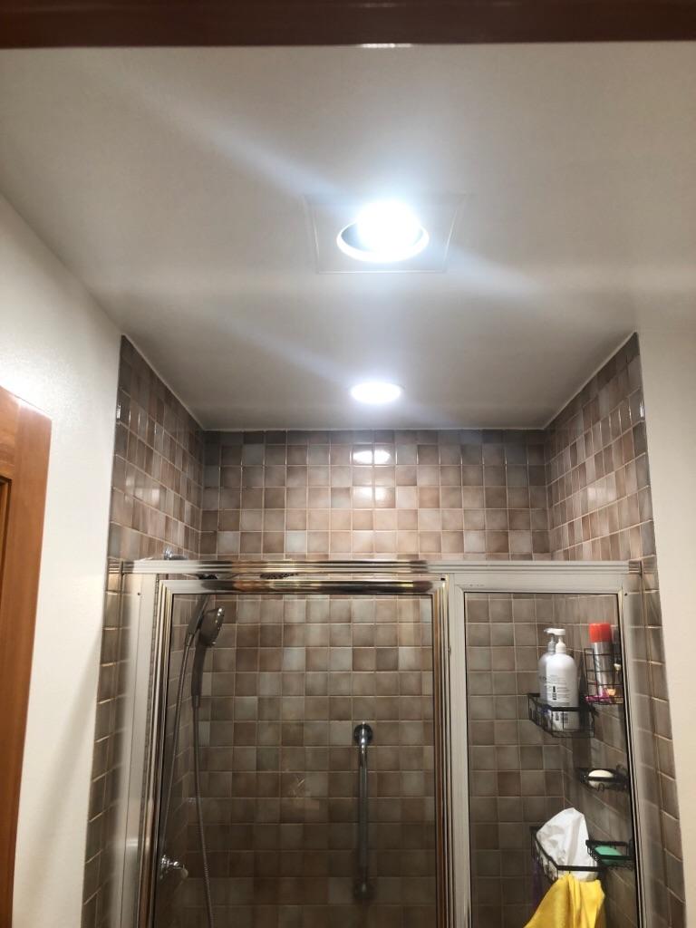 Enhance your bathroom experience with the expert electrical and lighting solutions offered by Shocking Difference LLC, where quality meets professionalism.
