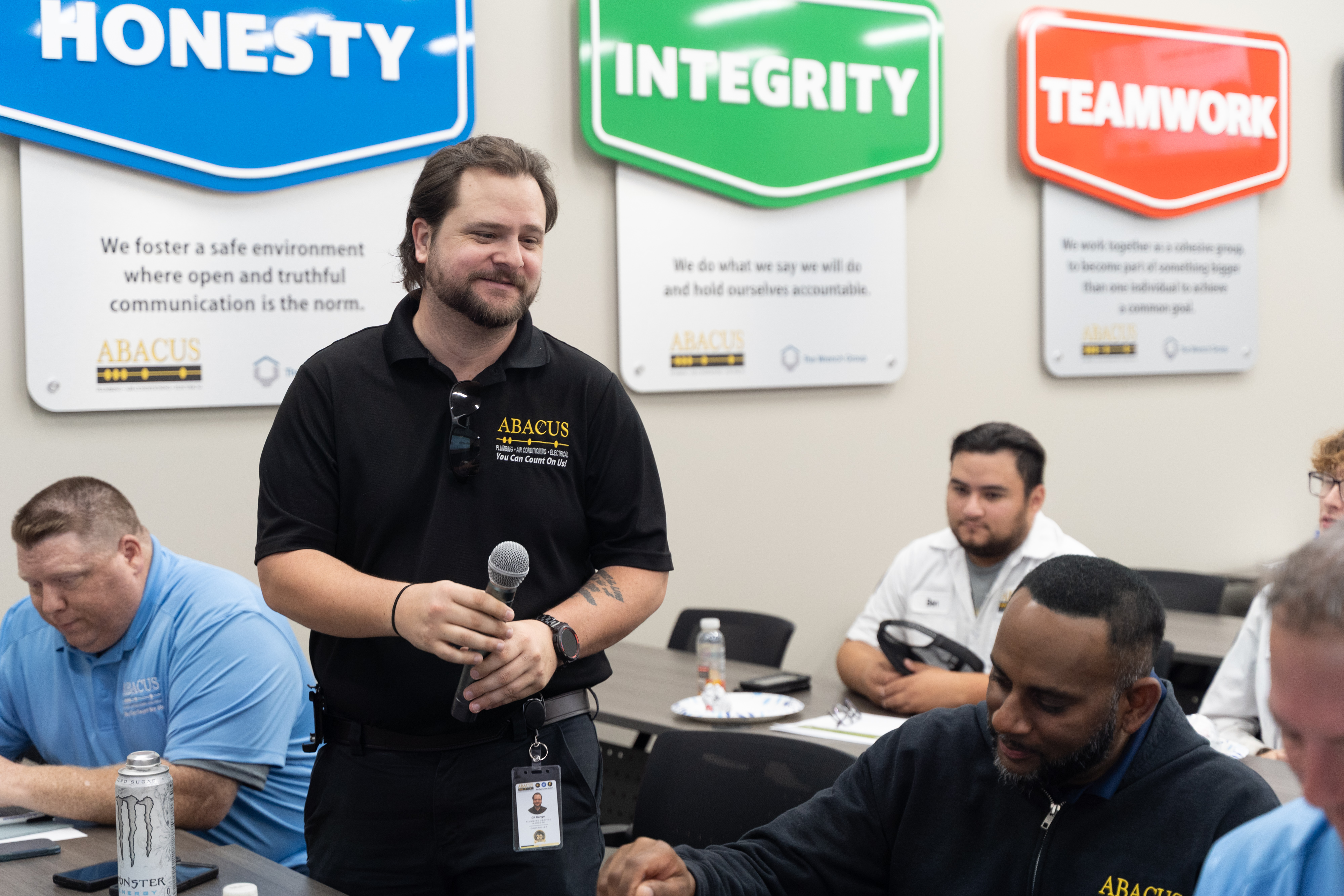 Abacus Plumbing, Air Conditioning, & Electrical showcases teamwork and professional training that build customer trust and dependable service.