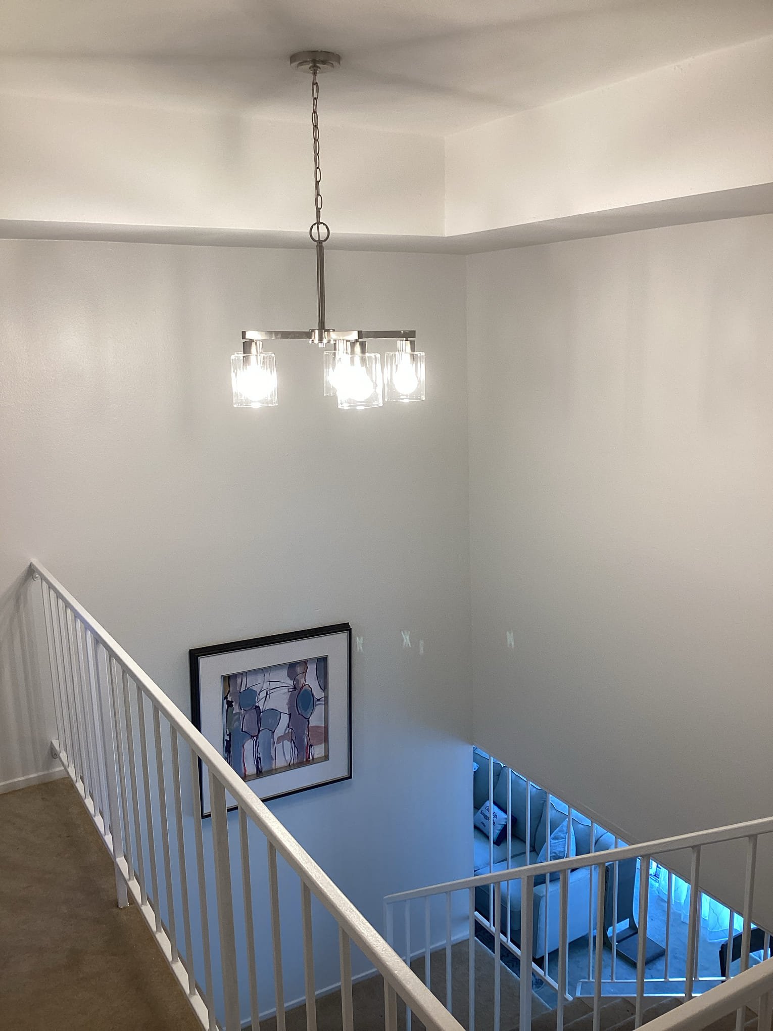 A bright, neatly installed chandelier adds lasting value and confident craftsmanship to your home with Powell Electric.
