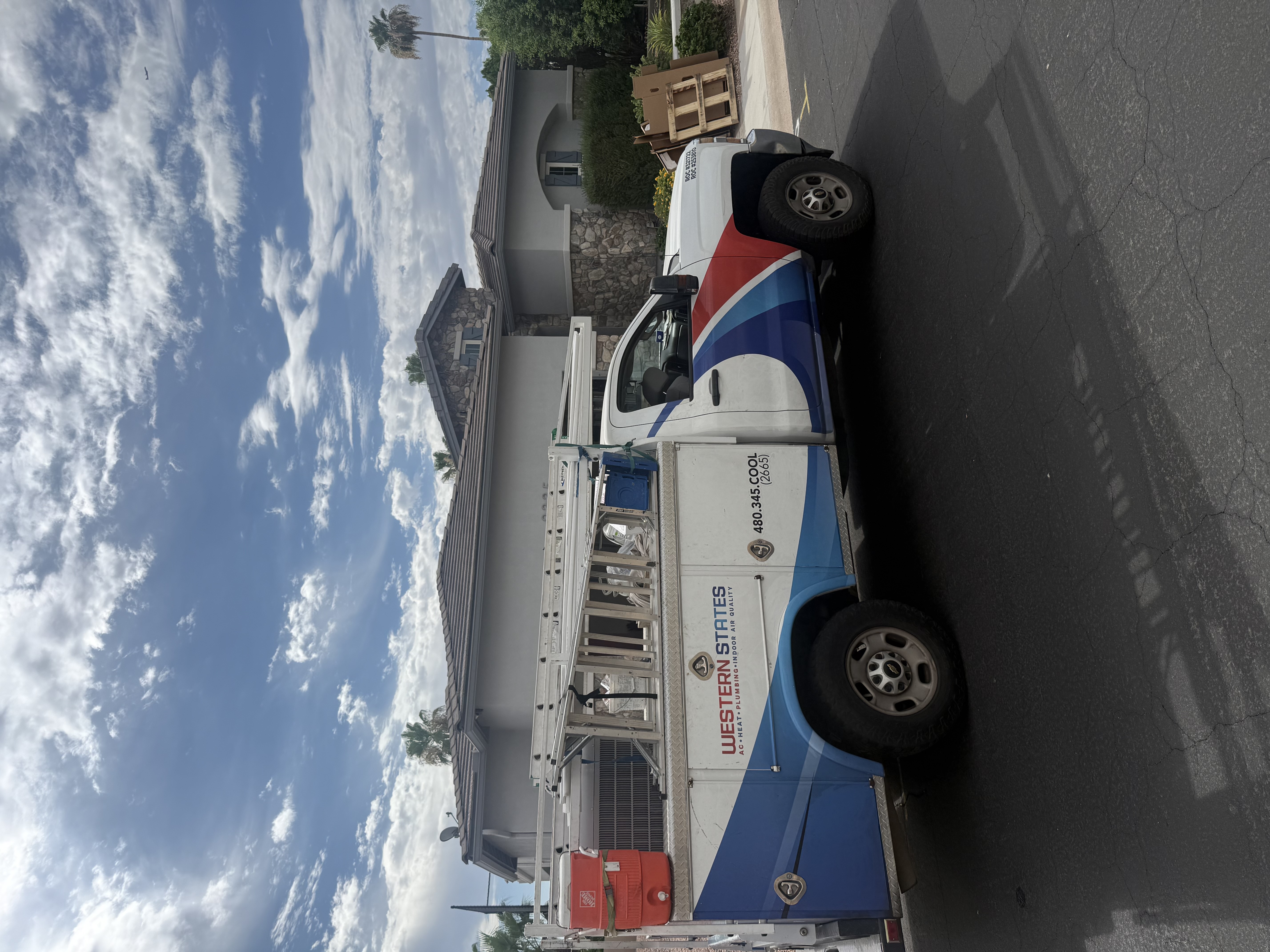 A Western States Home Services technician on site, delivering reliable, professional HVAC and plumbing care with visible tools and preparedness.