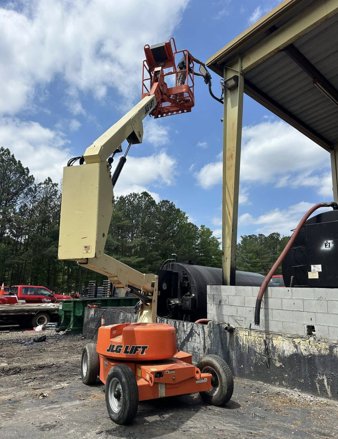 Skilled technicians from Kalahari Electrical Services safely complete elevated site work using professional access equipment, showcasing reliable craftsmanship.
