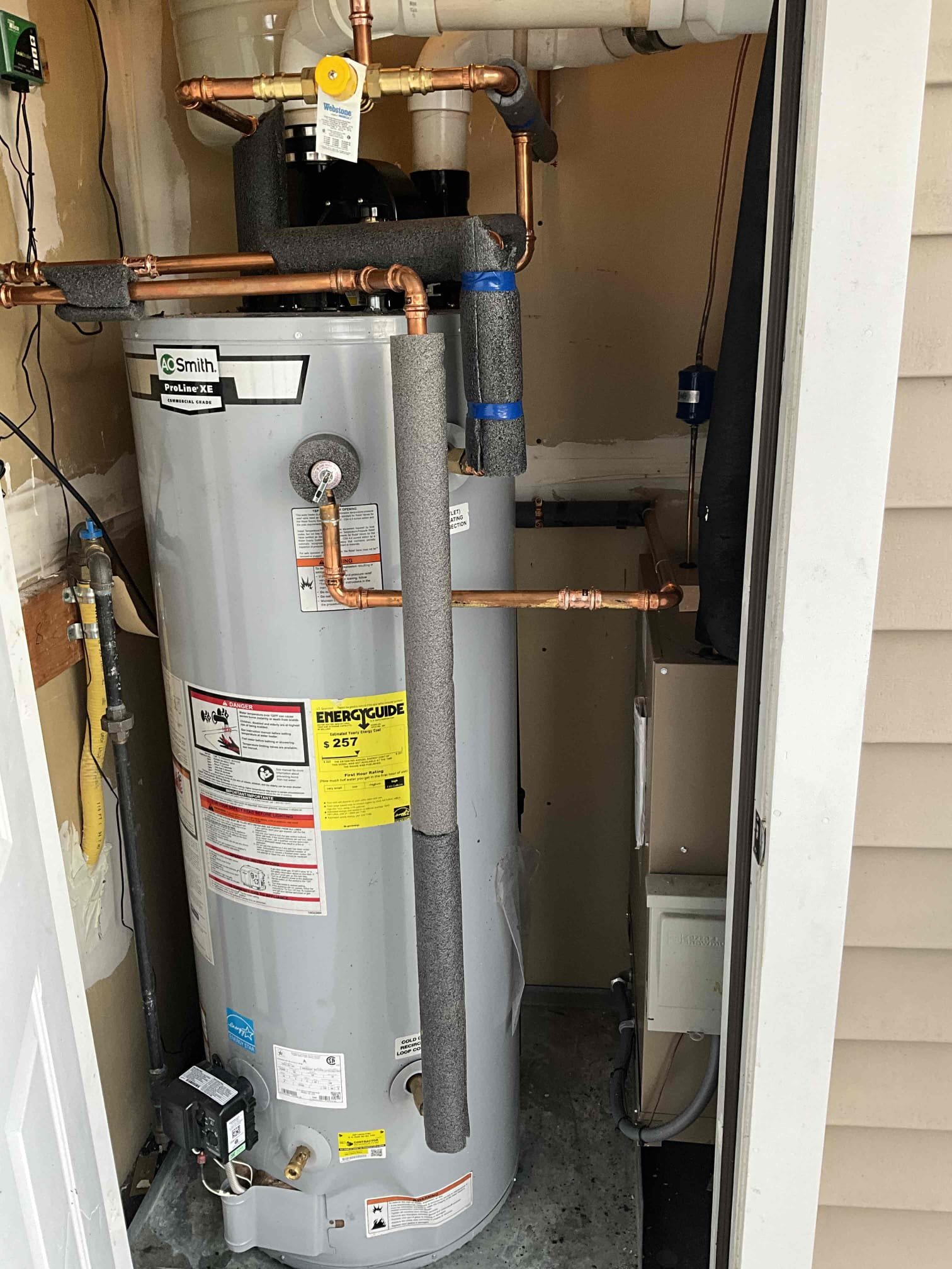 Experience the top-notch plumbing services of Akian Plumbing, Heating, Cooling & Electric, where quality installations like this water heater meet professionalism.
