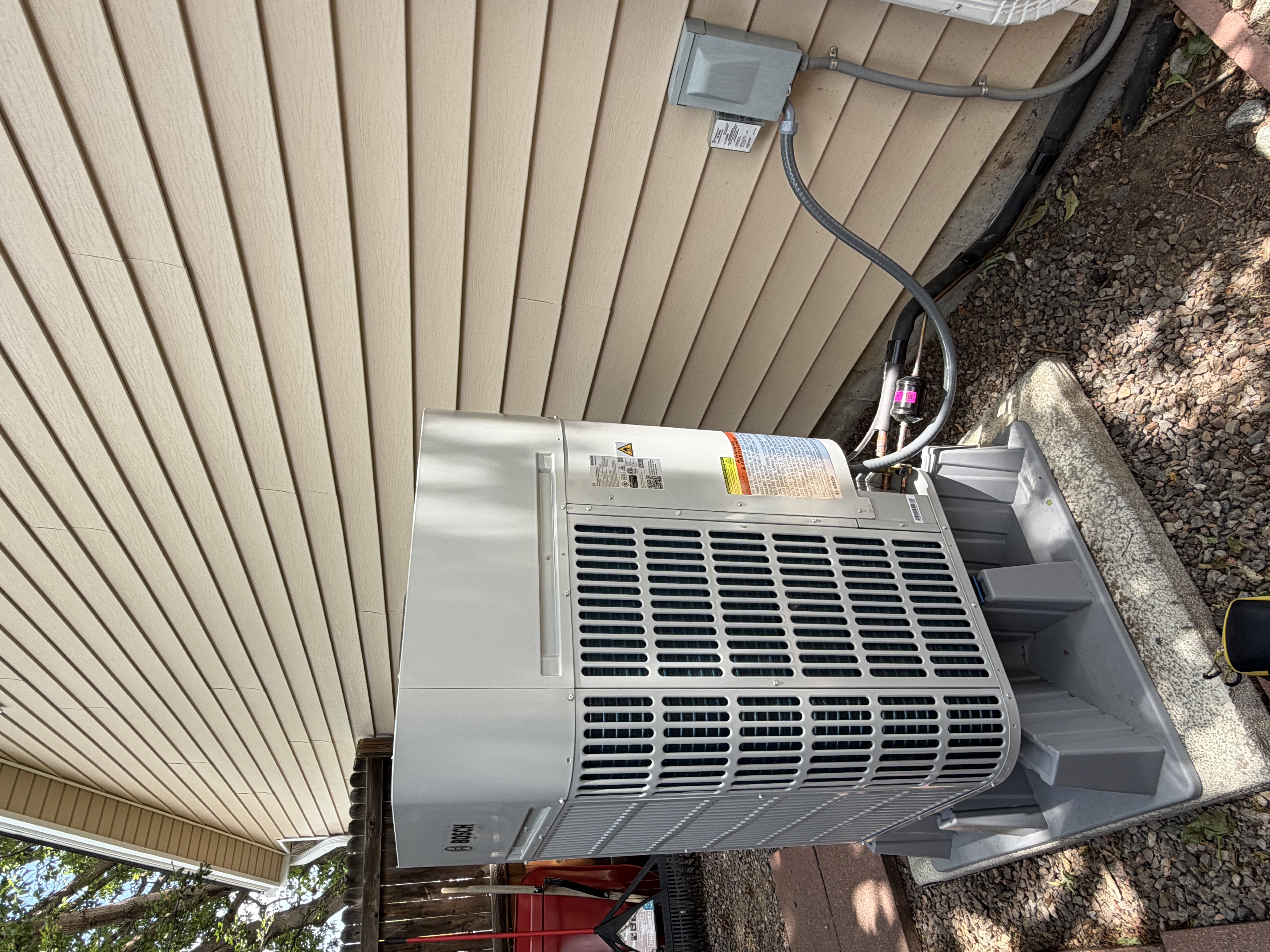 A crisp, professionally installed outdoor AC unit shows the care and reliability customers expect from Simply Mechanical AC, Furnace & Boiler Repair.