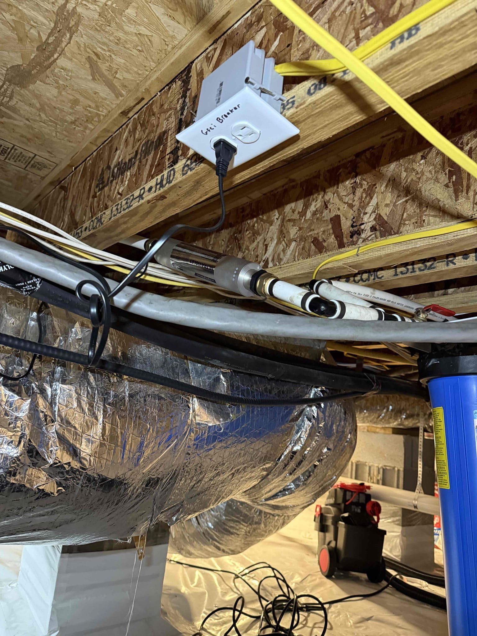 Dawson's Electric & Air demonstrates quality craftsmanship in crawlspace installations, keeping ducts insulated and systems neatly organized.
