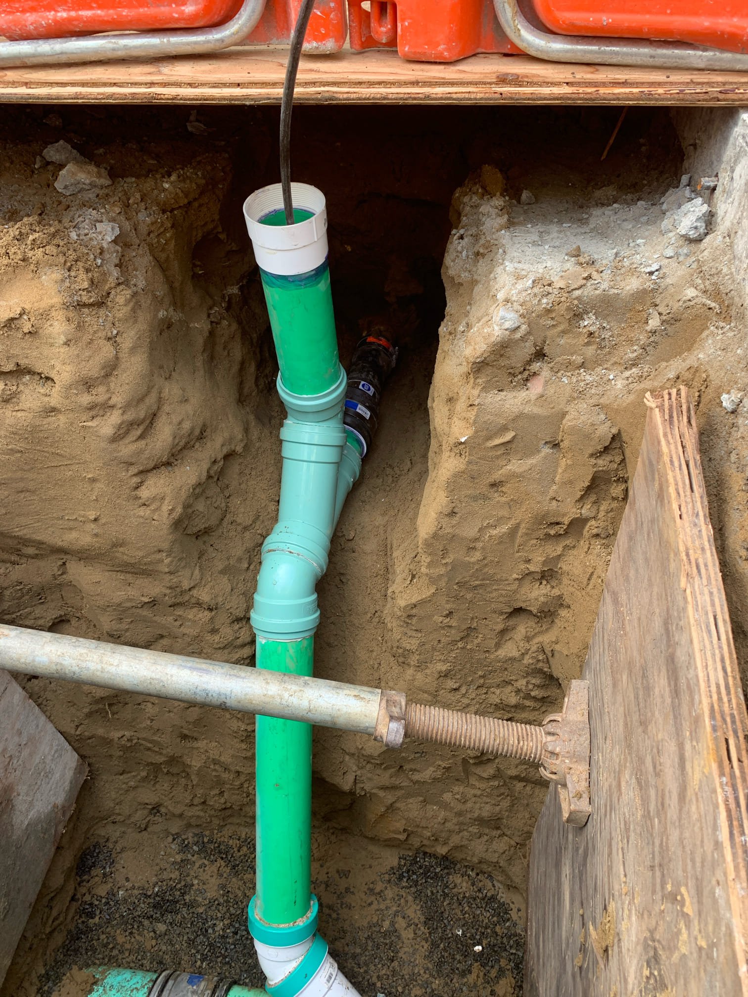 Skilled trench work and precise PVC sewer installation highlight Magic Plumbing Heating & Cooling's commitment to durable, reliable repairs.