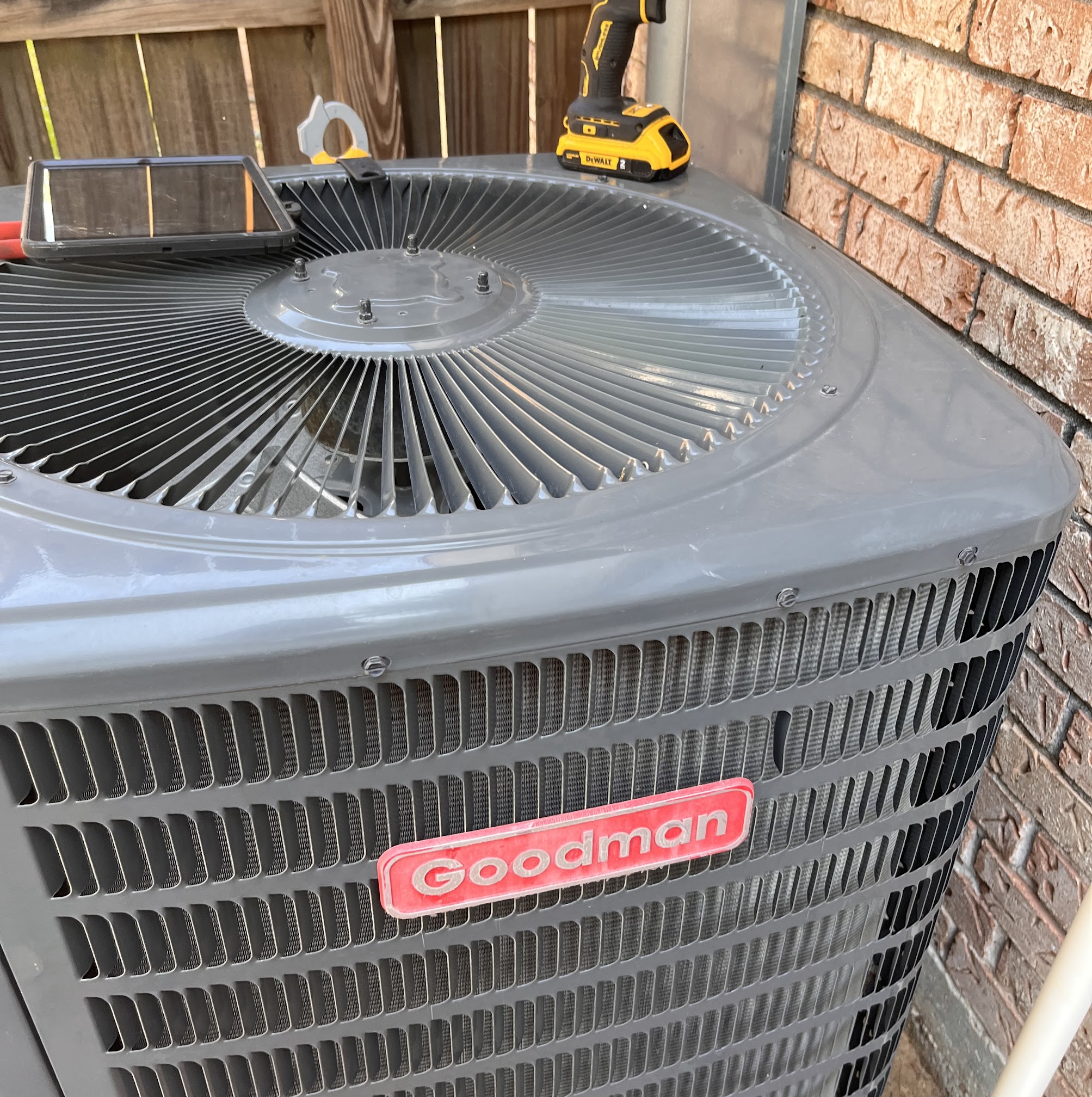 Skilled technicians from Abacus Plumbing, Air Conditioning & Electrical perform careful on-site AC maintenance to keep your Goodman unit running reliably.