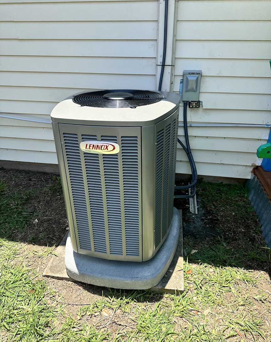 A clean, professionally installed Lennox condenser showcases the reliability and care Abacus Plumbing, Air Conditioning, & Electrical provides for home comfort.