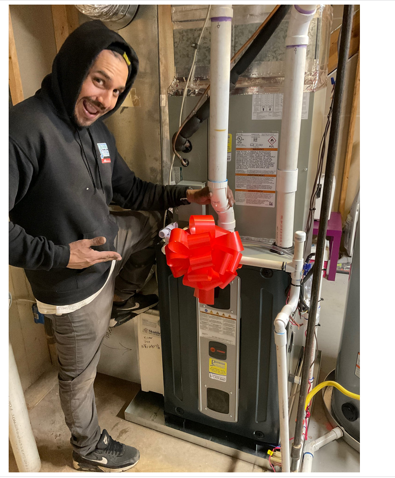 Experience top-notch heating system installations with Parrish Services - where customer satisfaction is wrapped with a bow!