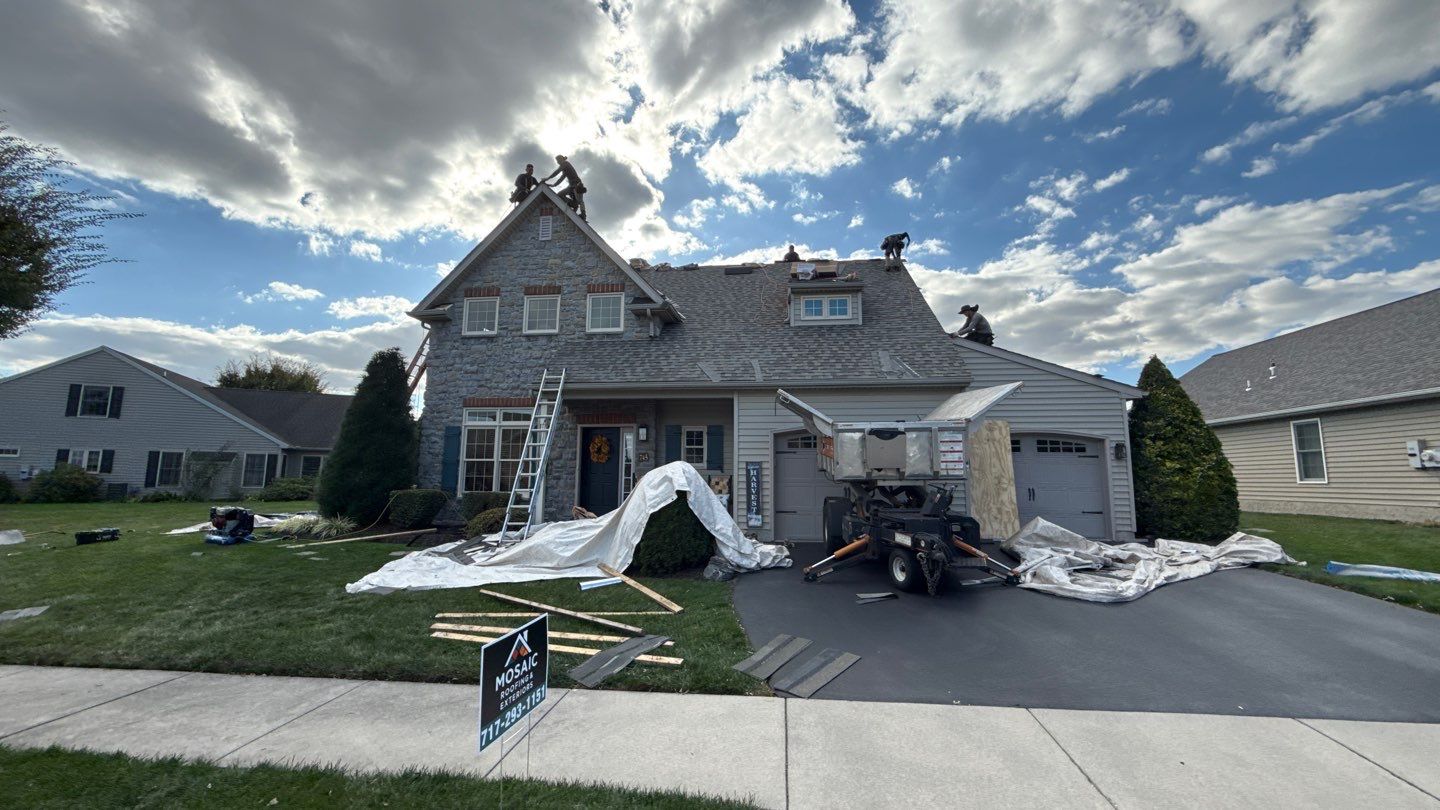 Visible craftsmanship and careful cleanup highlight Mosaic Roofing & Exteriors commitment to durable roof replacements and protecting your property.