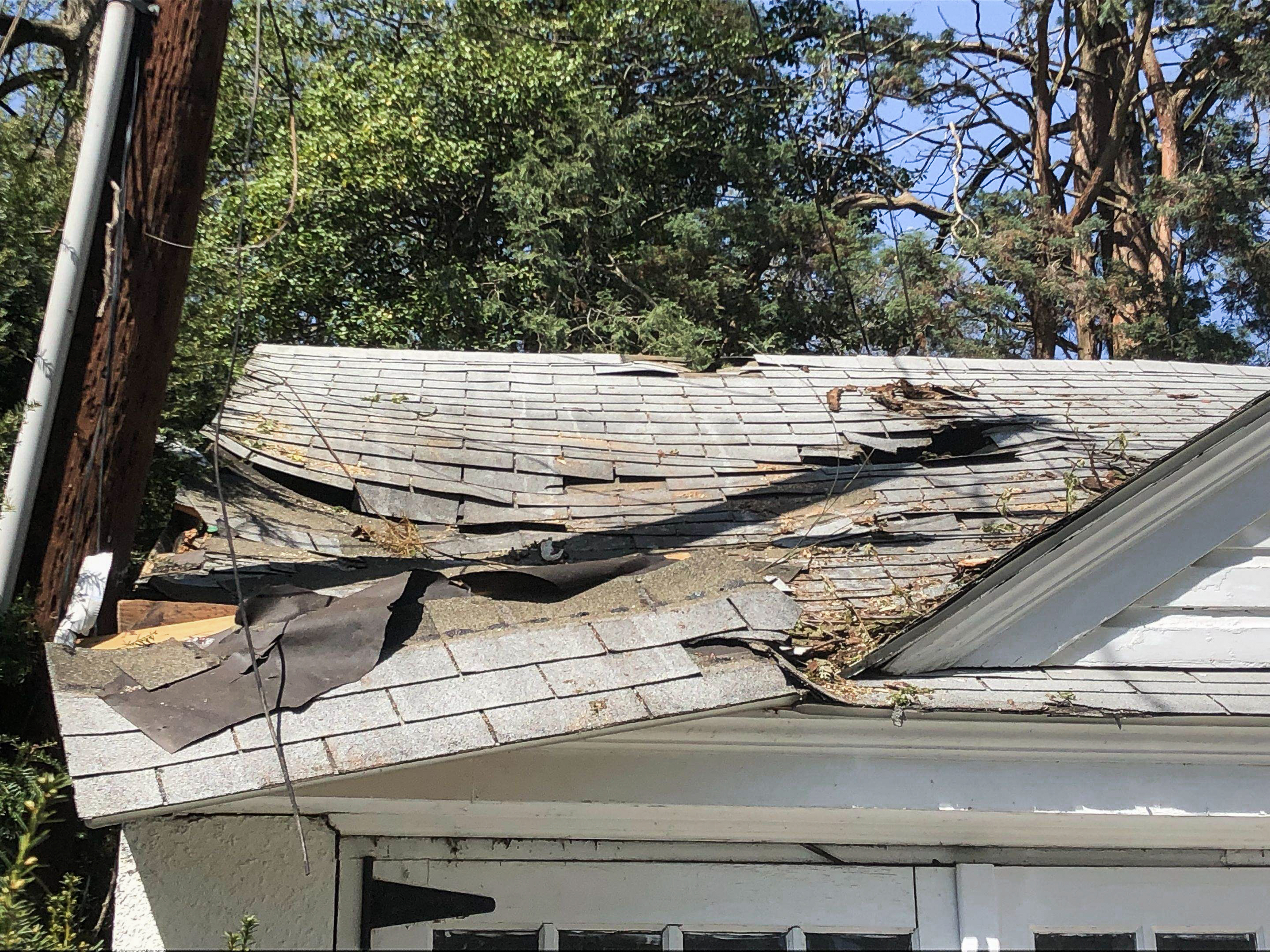 Ensure your home's safety with Mast Roofing & Construction's Storm Damage Restoration services.