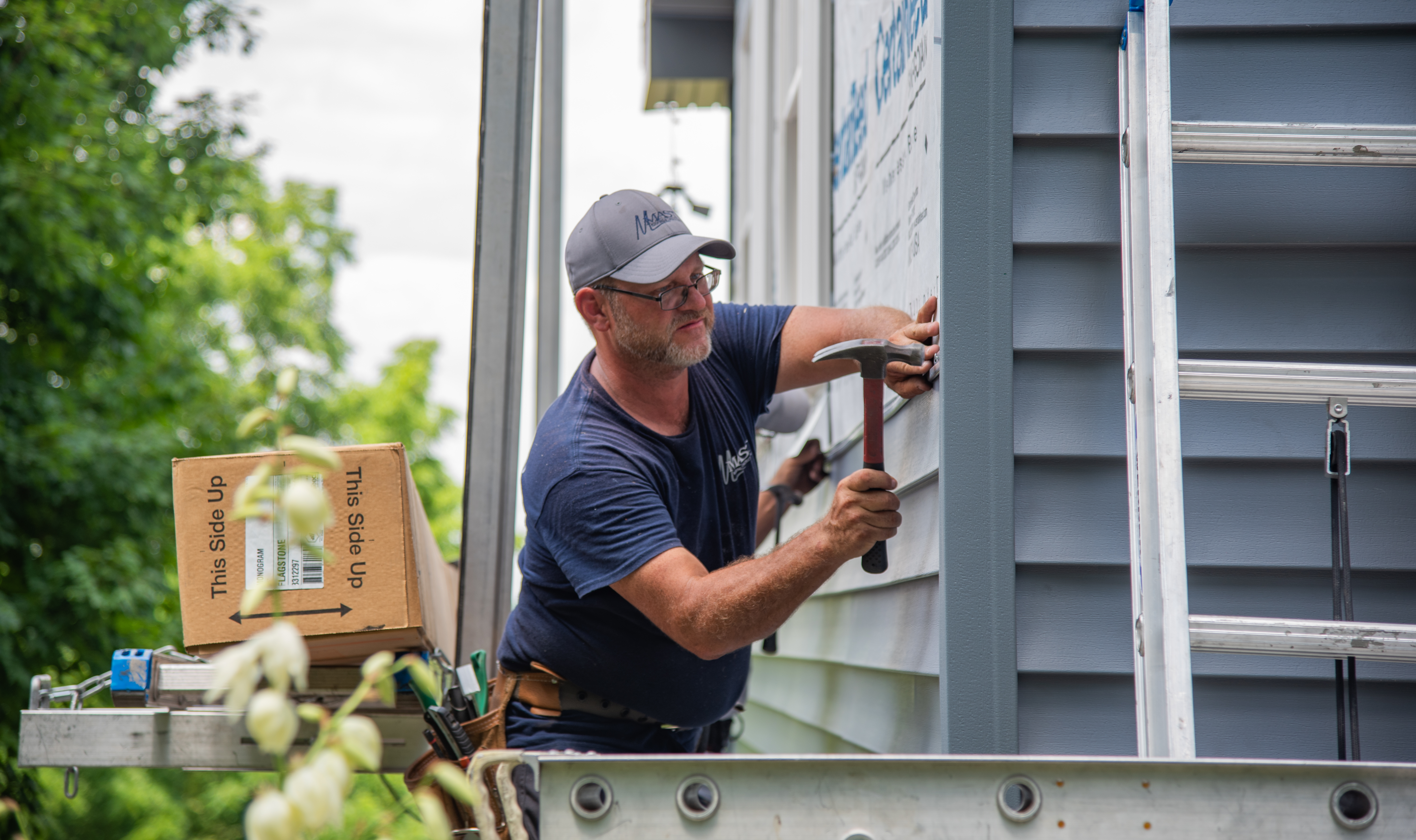 Crafting quality and commitment - Mast Roofing & Construction brings precision to every project!