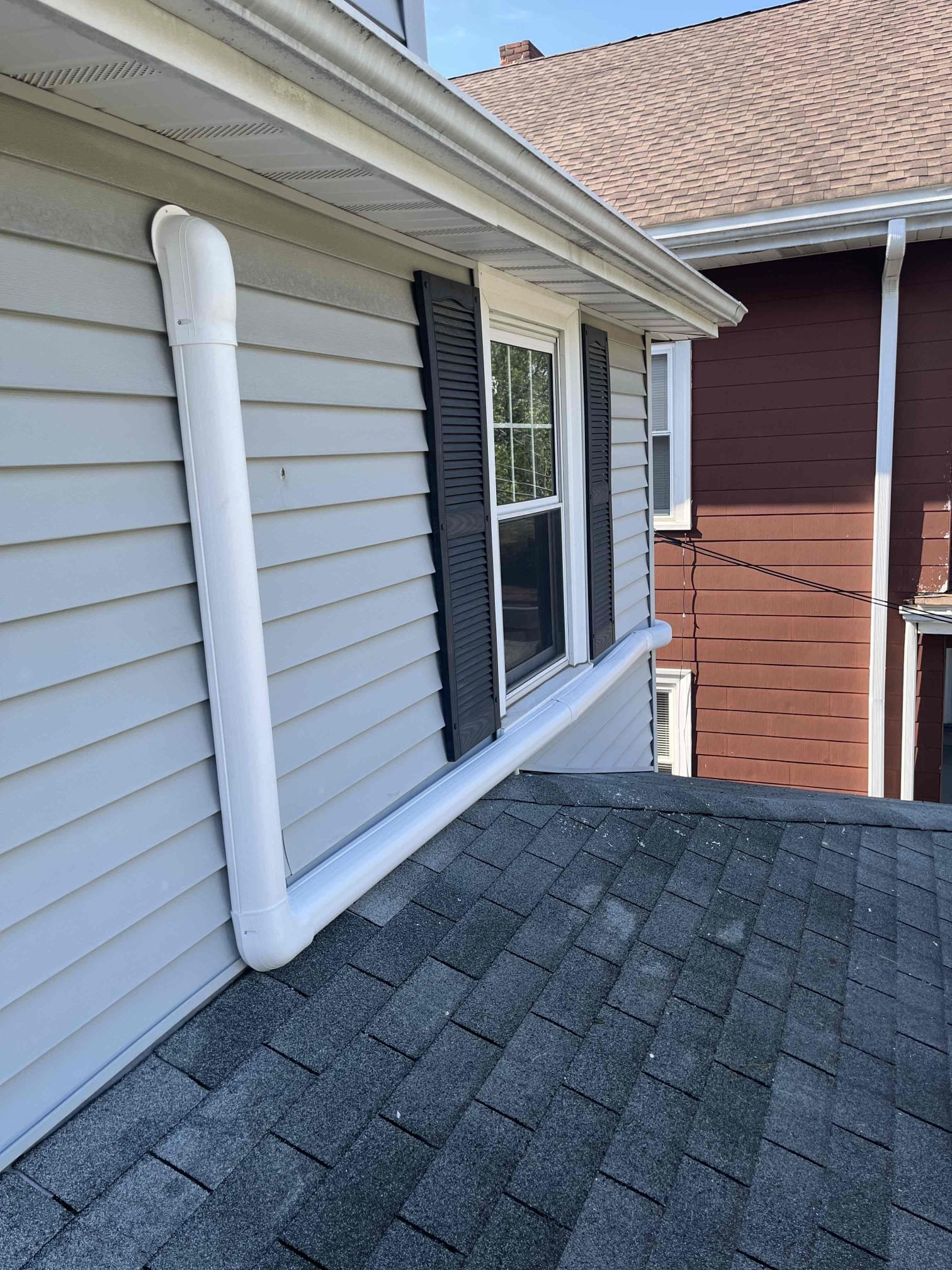Clean, neatly routed exterior piping highlights the craftsmanship customers trust from Akian Plumbing, Heating, Cooling & Electric.