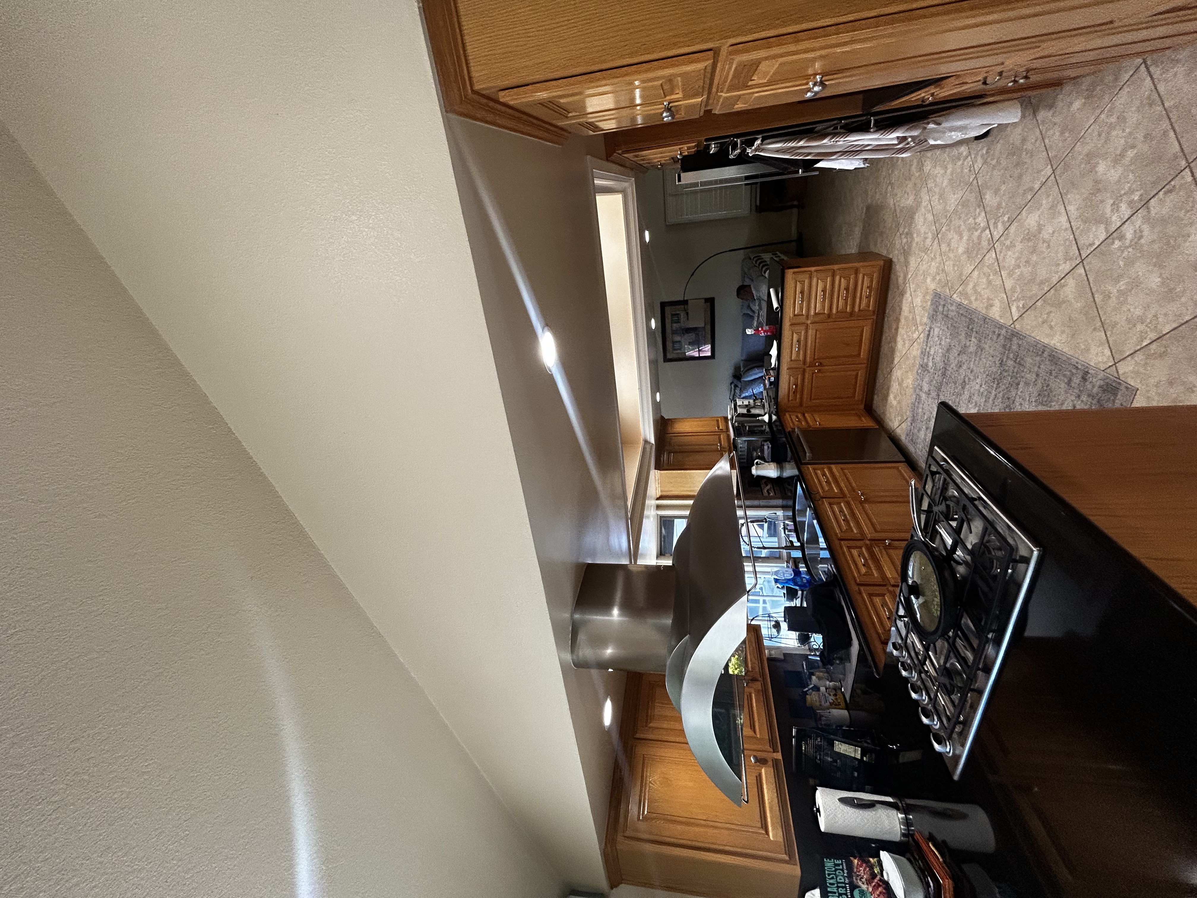 Powell Electric upgraded recessed lighting and ensured a neat installation, leaving this kitchen bright and professionally finished.