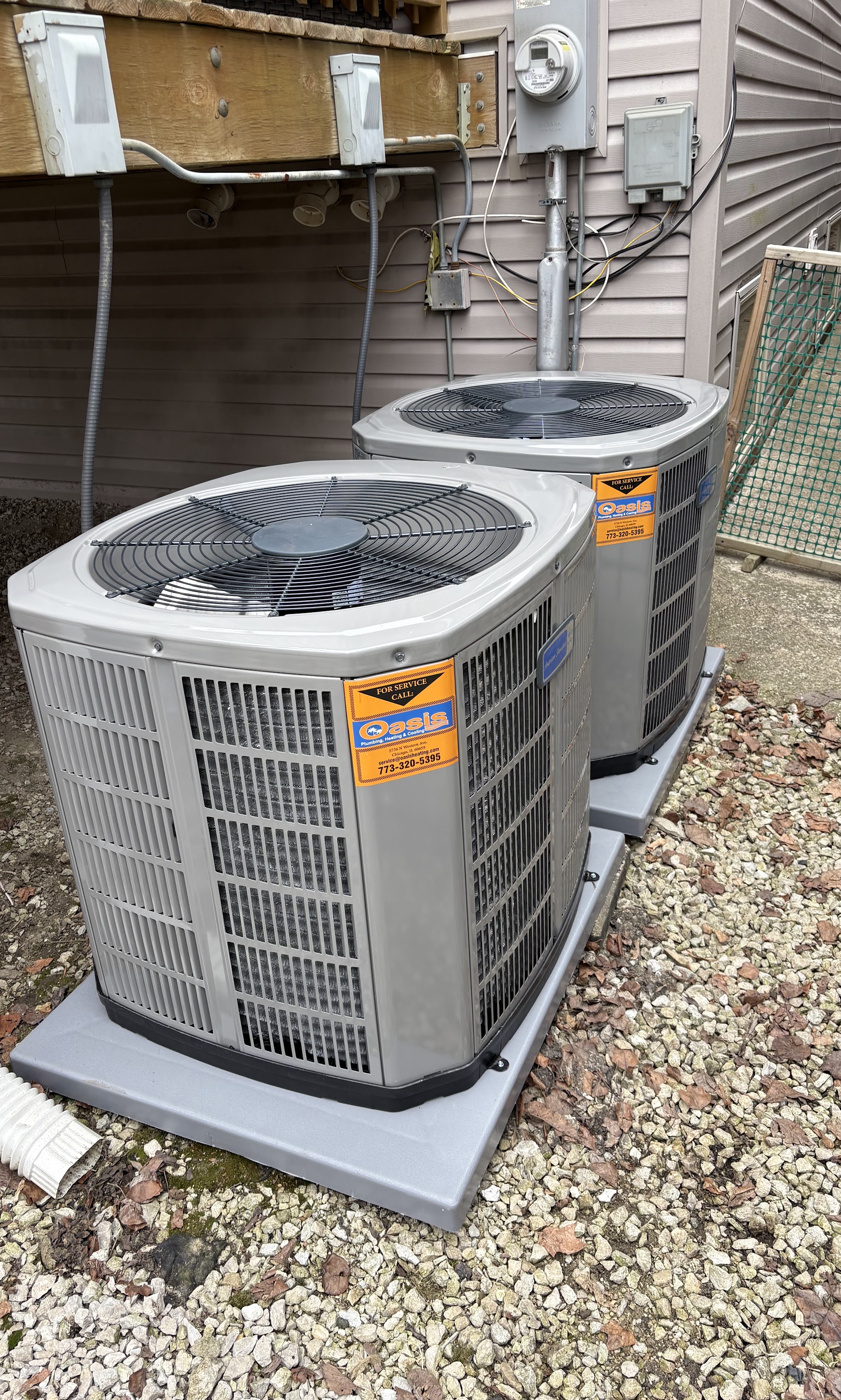 Dependable residential cooling installed and labeled for easy service, Oasis Heating and Cooling ensures trustworthy performance and clear support contact.