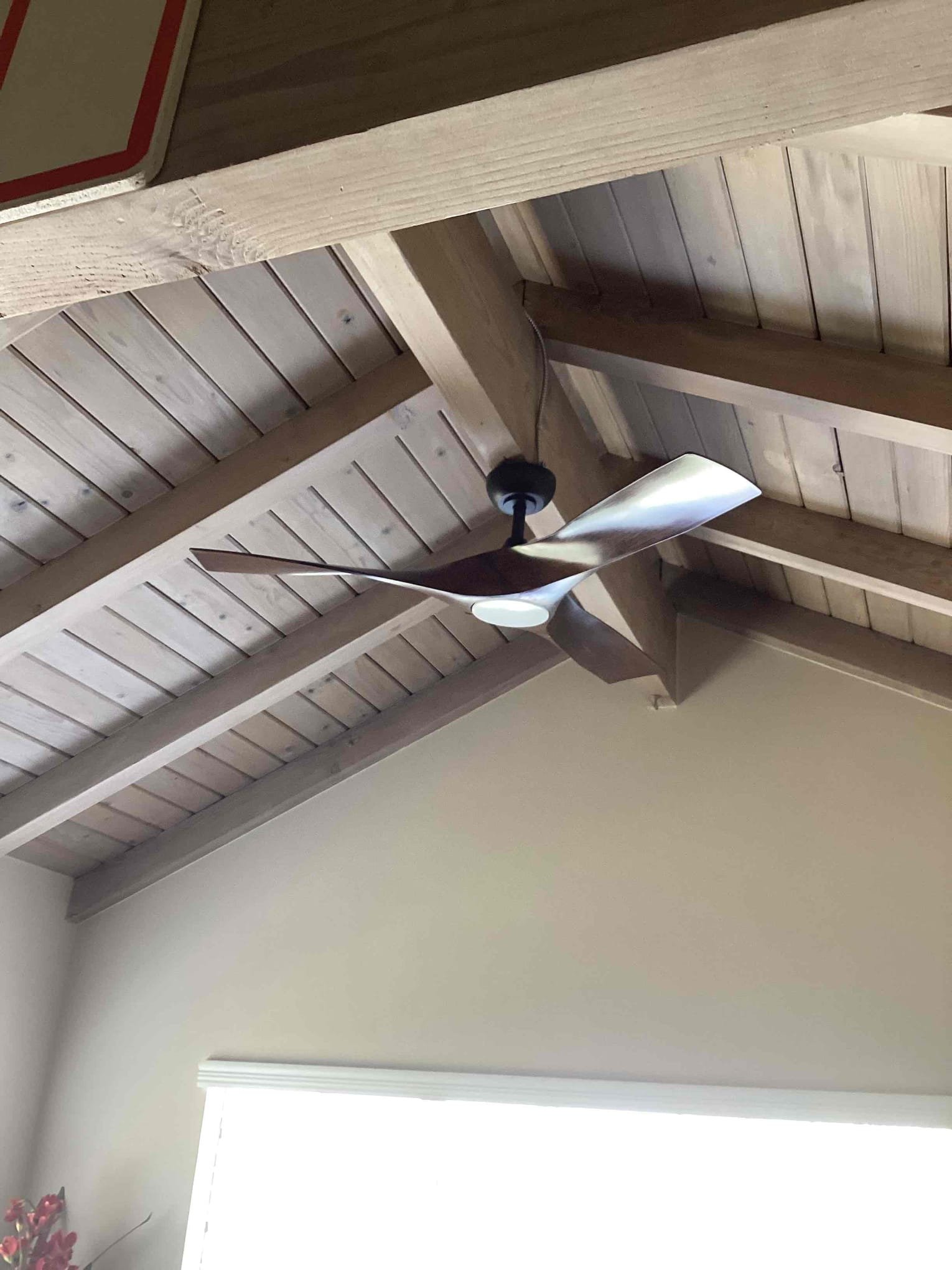 Powell Electric delivers careful, safety-focused ceiling fan installations that complement high-end exposed beam interiors.