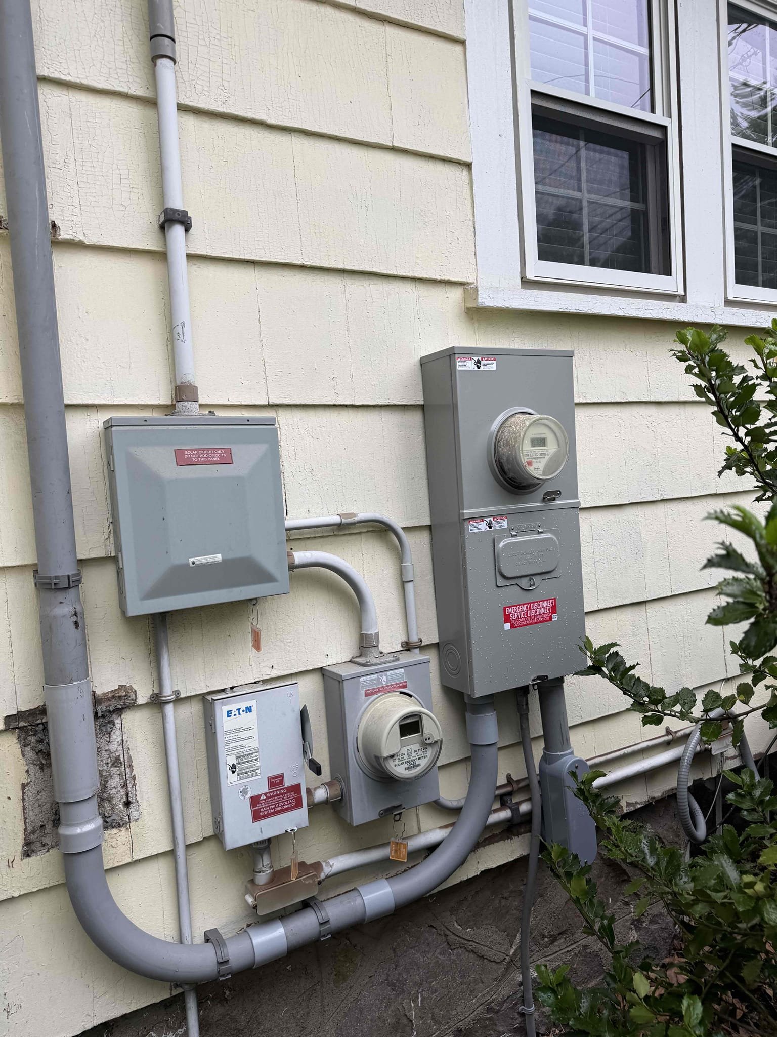Professional exterior electrical work is clearly shown here, demonstrating the dependable installations provided by Akian Plumbing, Heating, Cooling & Electric.