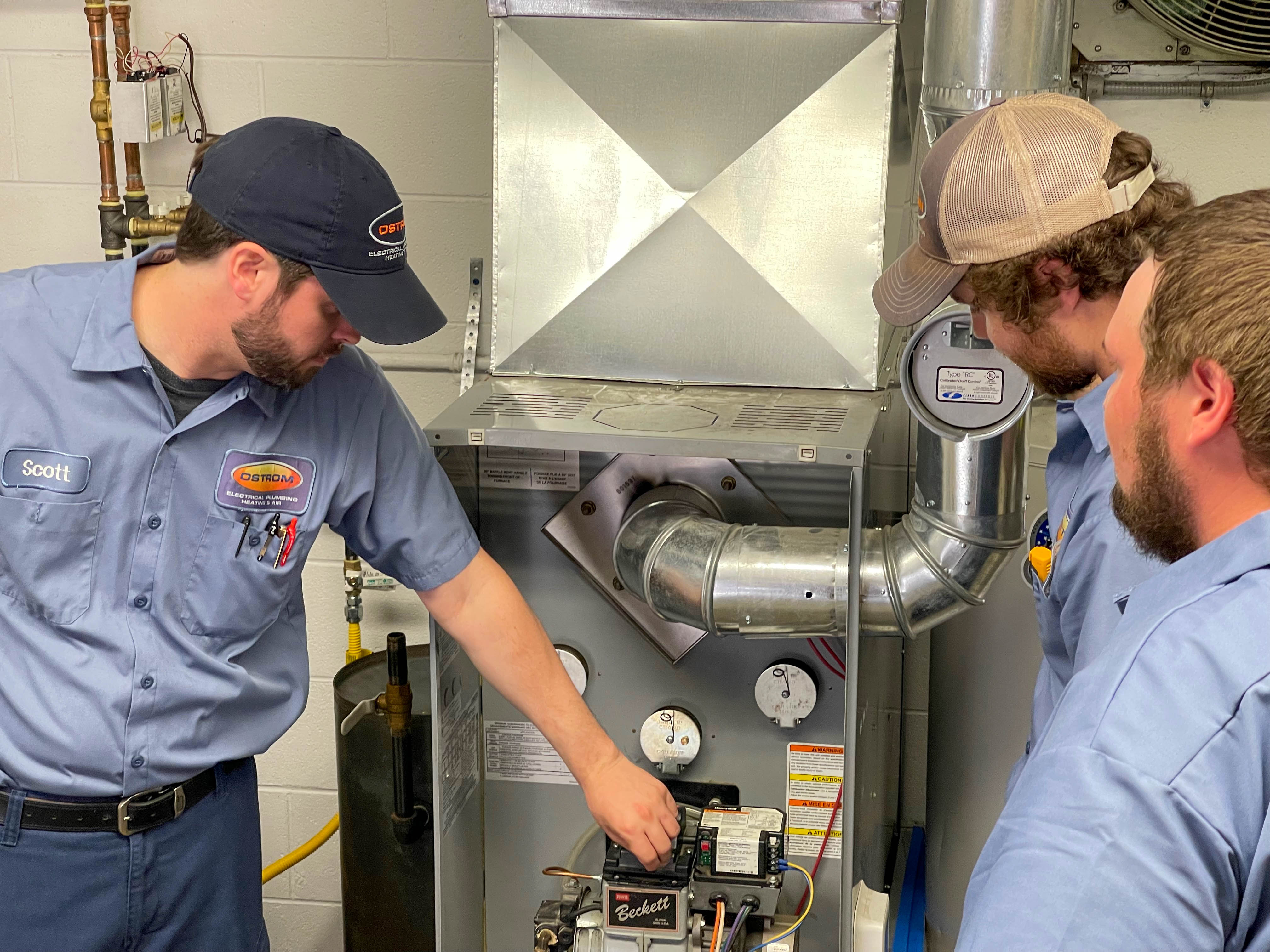 Expert technicians at Ostrom Electrical Plumbing Heating & Air Conditioning ensure reliable HVAC services, providing quality and professionalism.