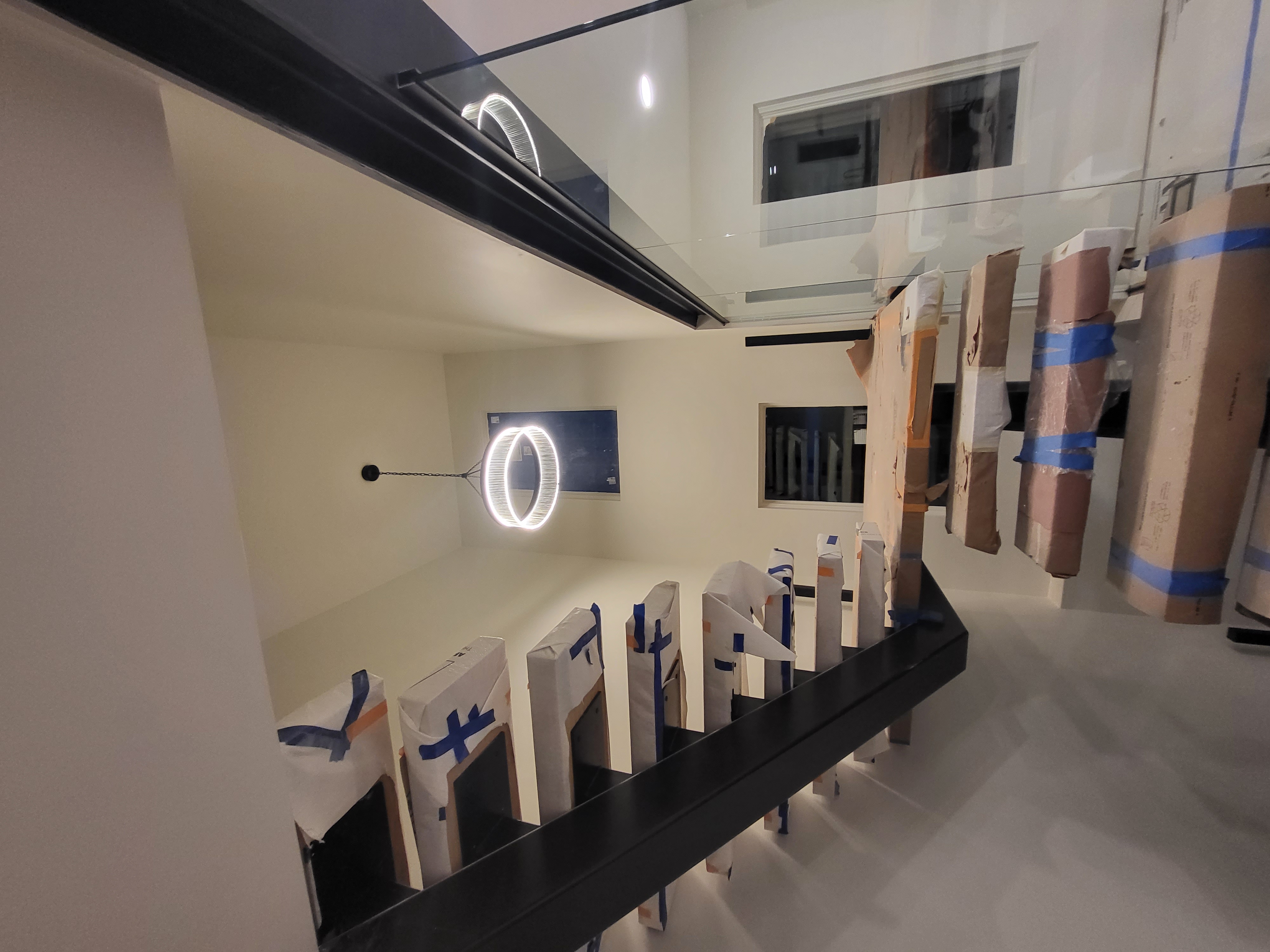 Elevate your home with Next Level Pros' professional installation of modern staircases and lighting.