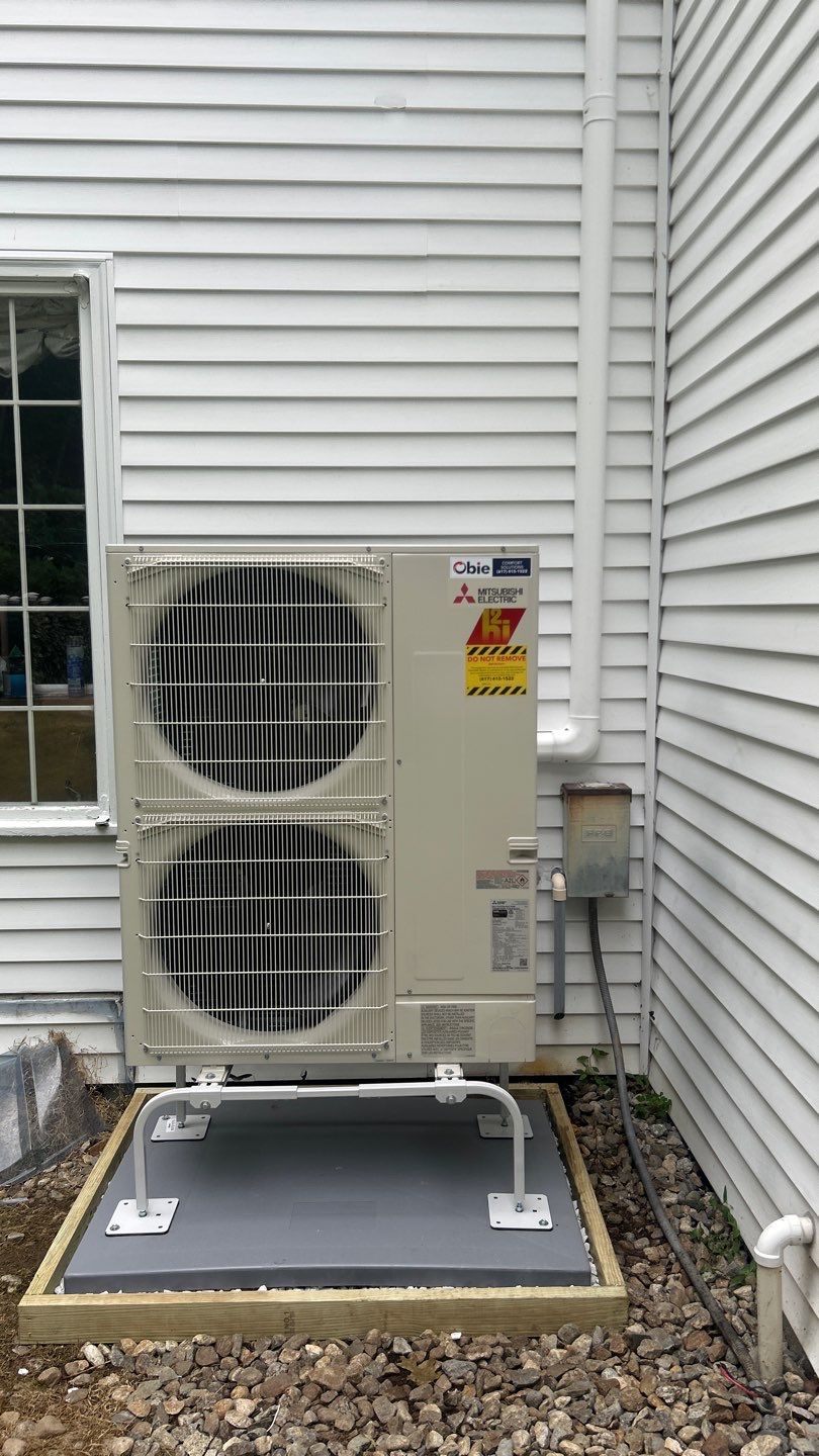 Clean, reliable installation by Obie Comfort Solutions shows careful placement and secure mounting for long lasting HVAC performance.