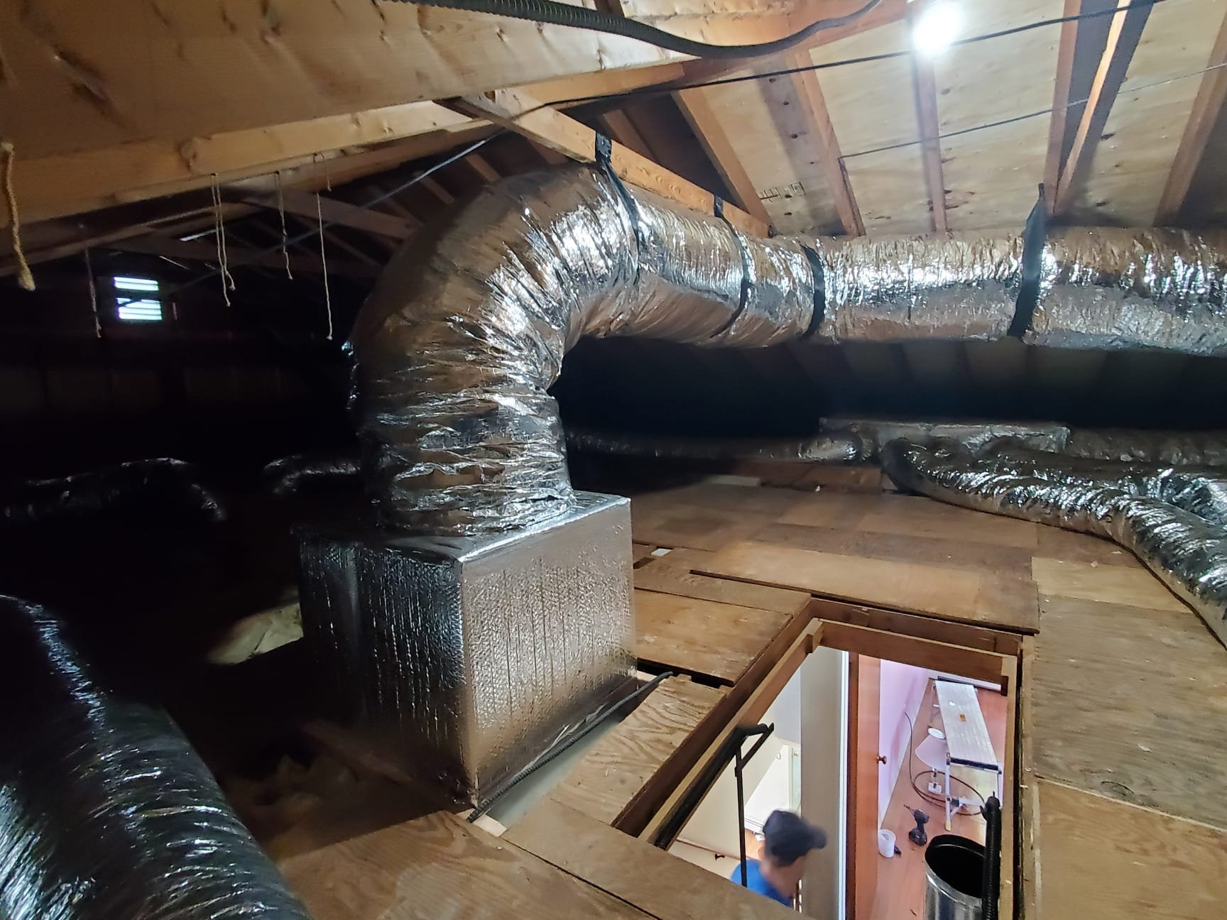 Optimize your home's air quality with the expert HVAC services of Service Professionals. Our skilled technicians ensure efficient duct installation even in the tightest spaces.