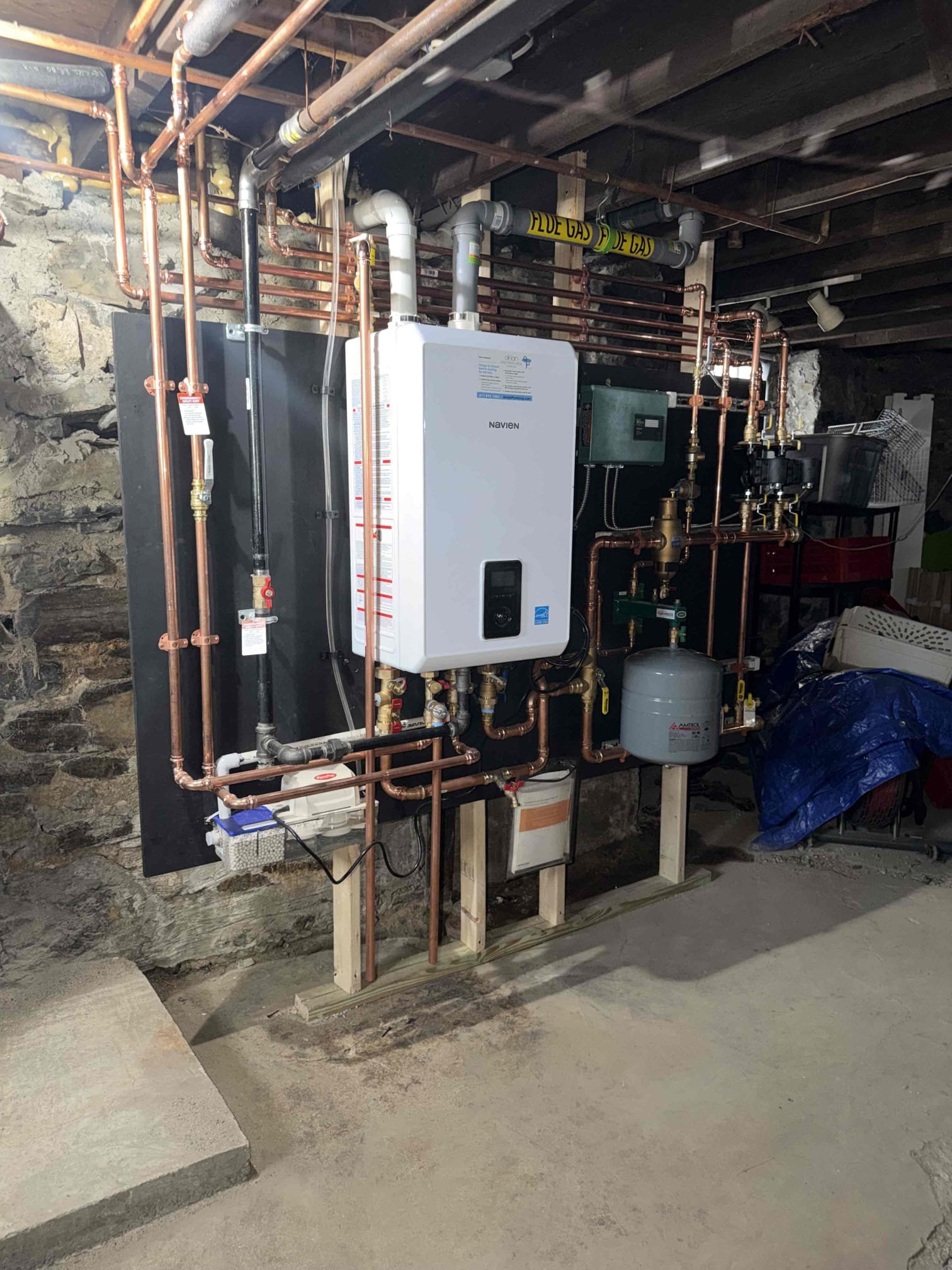 A precise, professionally installed boiler and piping layout shows how Akian Plumbing, Heating, Cooling & Electric delivers reliable, long-lasting home comfort.