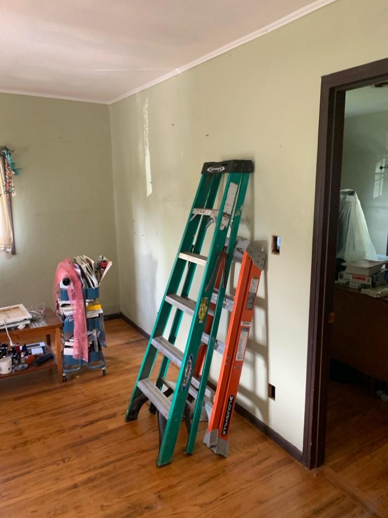 A tidy, professional repair scene shows attention to detail and safety while Shocking Difference LLC completes reliable interior electrical and repair work.