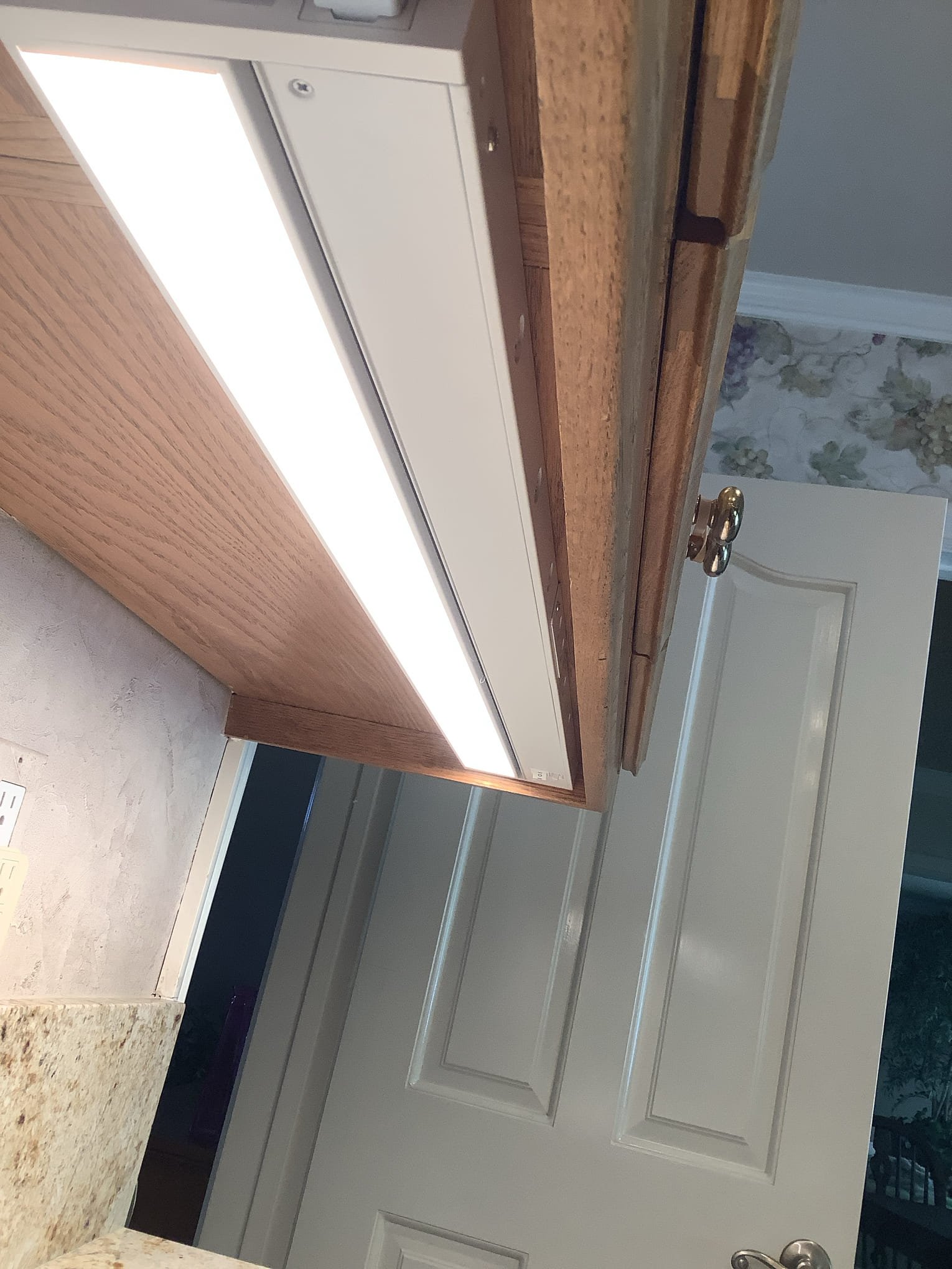 Powell Electric installed bright, even under-cabinet LED lighting to enhance bathroom task lighting while keeping a clean, finished look.