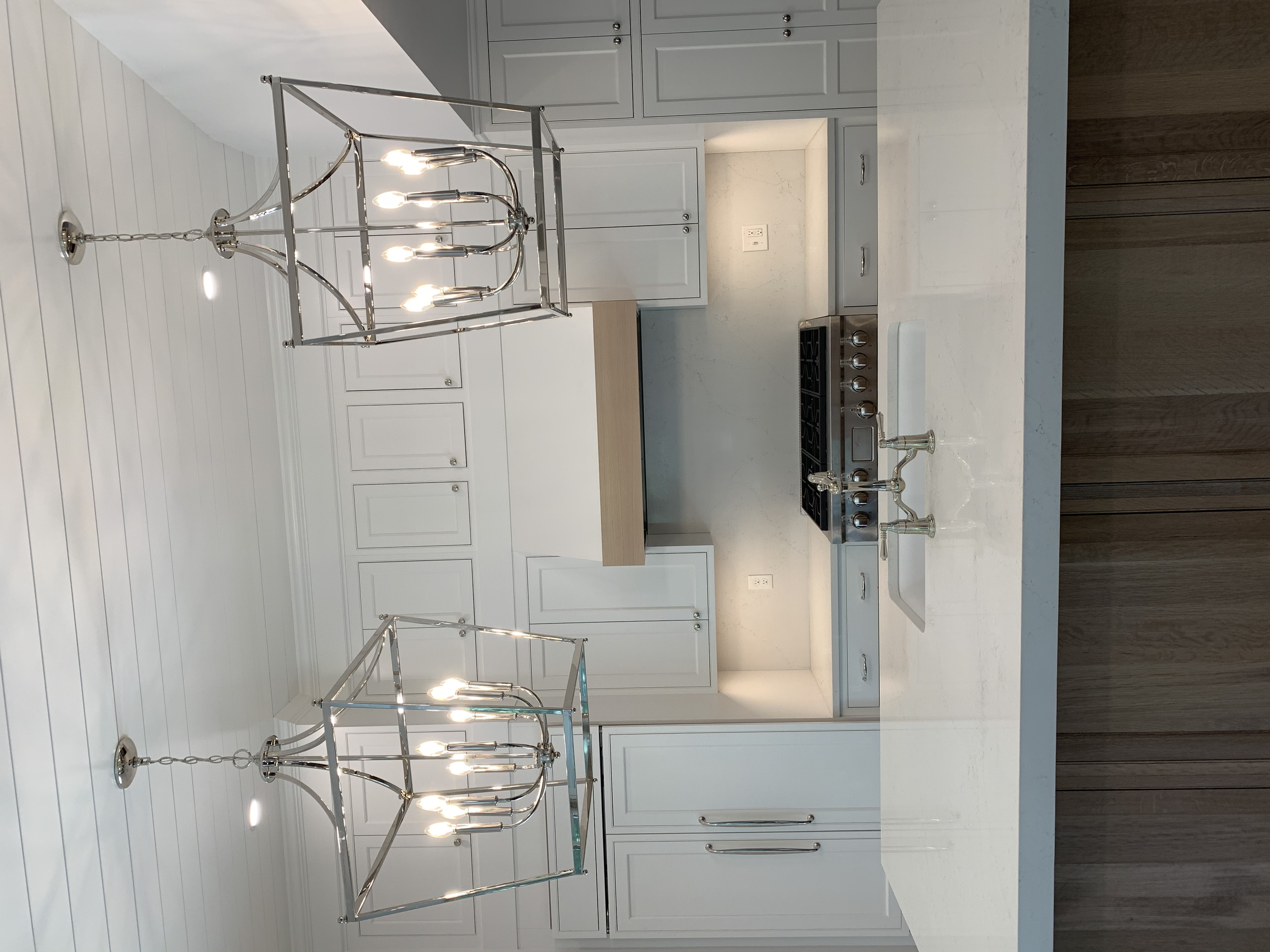 Illuminate your kitchen with elegance and precision—Castle Electric Inc. ensures exceptional quality and modern design in every installation.