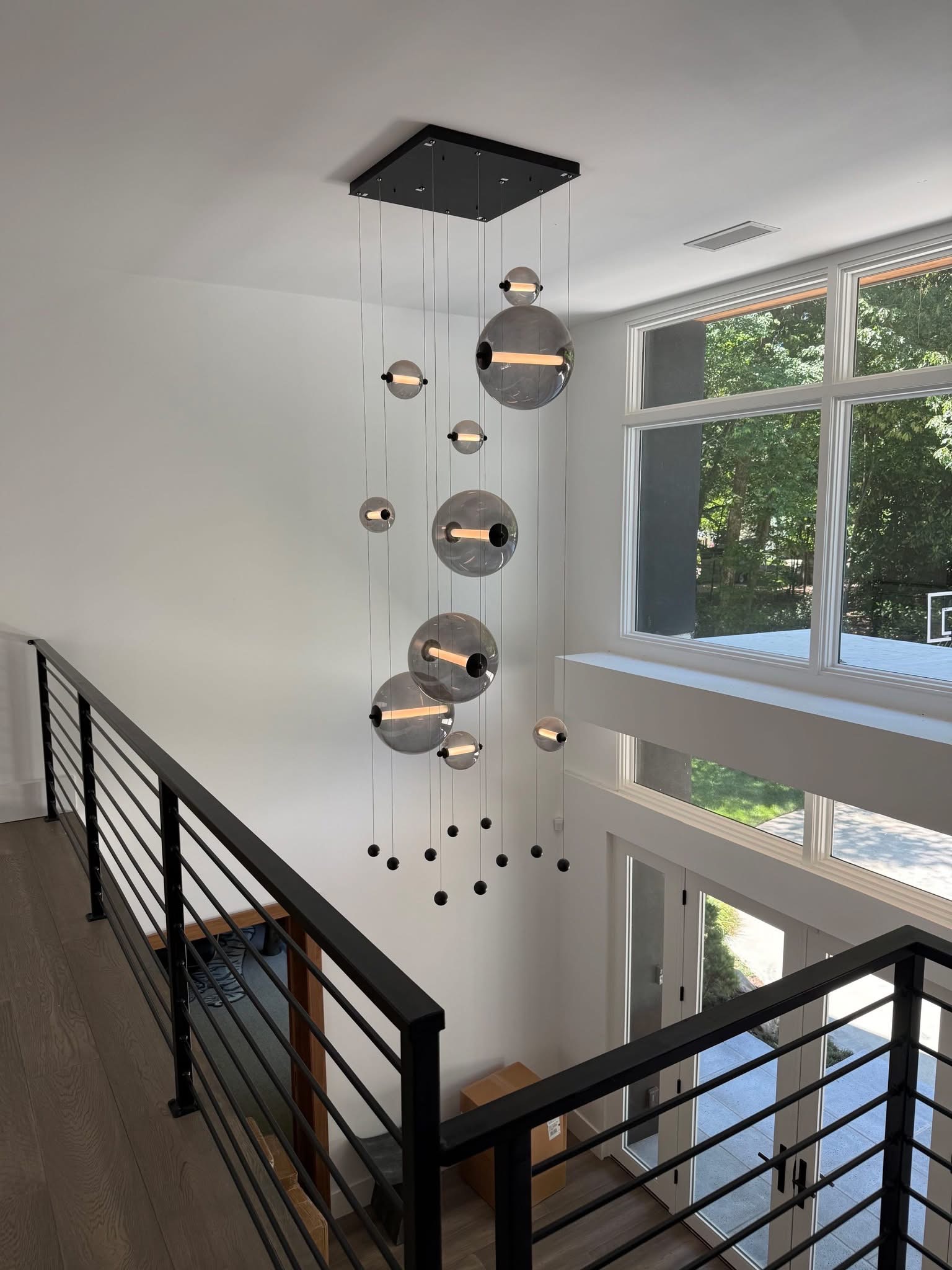 Bright modern foyer lighting showcases Kalahari Electrical Services craftsmanship and attention to safe, elegant installation for homes.