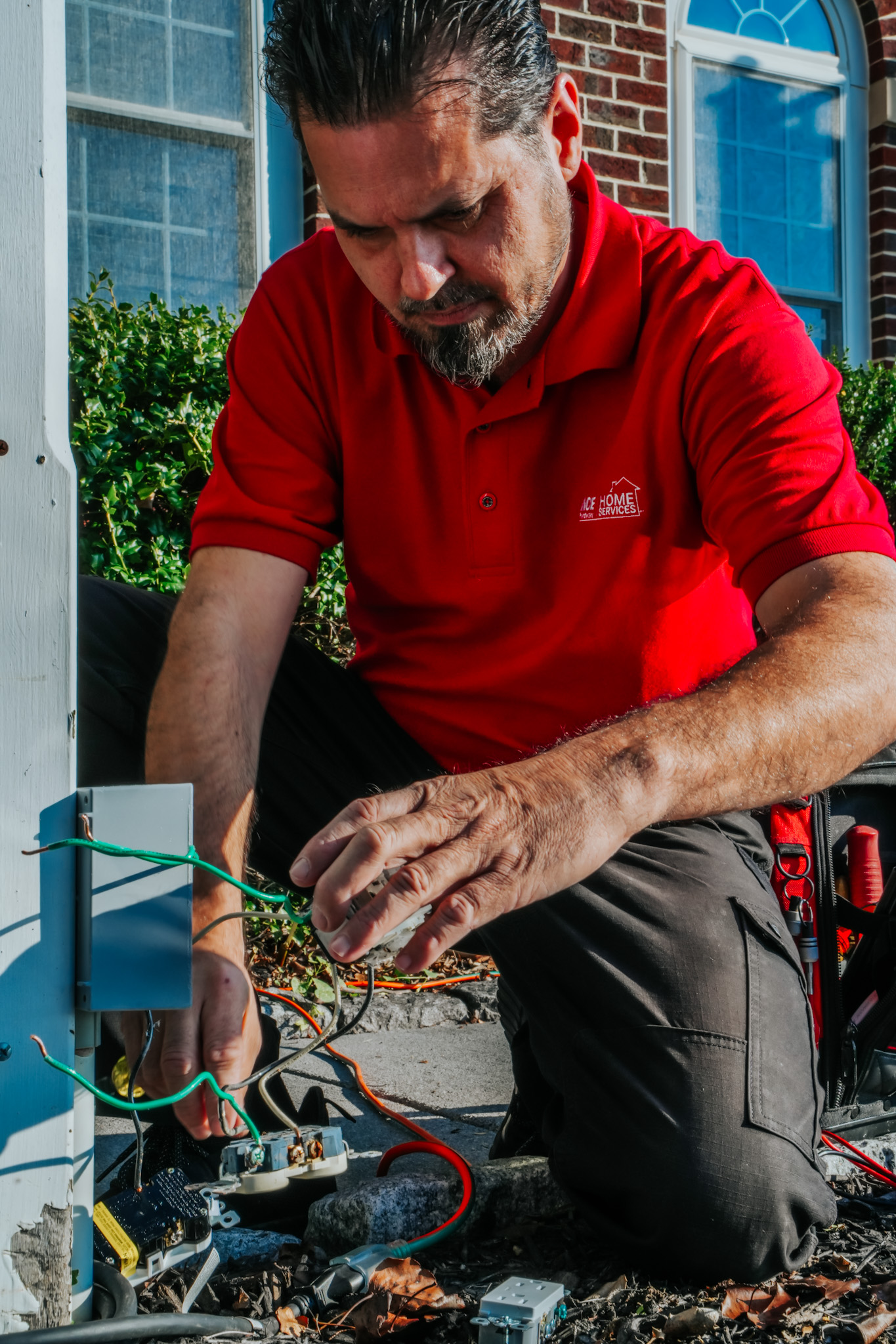 A focused Parrish Services technician delivers dependable on-site electrical repairs with care and professional attention to every detail.