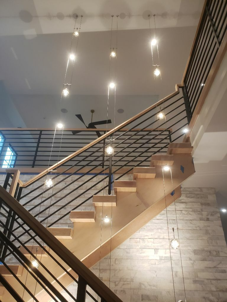 Transform your space with Aardvark Electric, Inc.'s stunning lighting installations and modern design solutions.