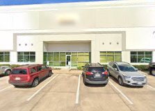 A clean, professional storefront and ready service vehicles show Abacus Plumbing, Air Conditioning & Electrical’s commitment to reliable, on-time service.