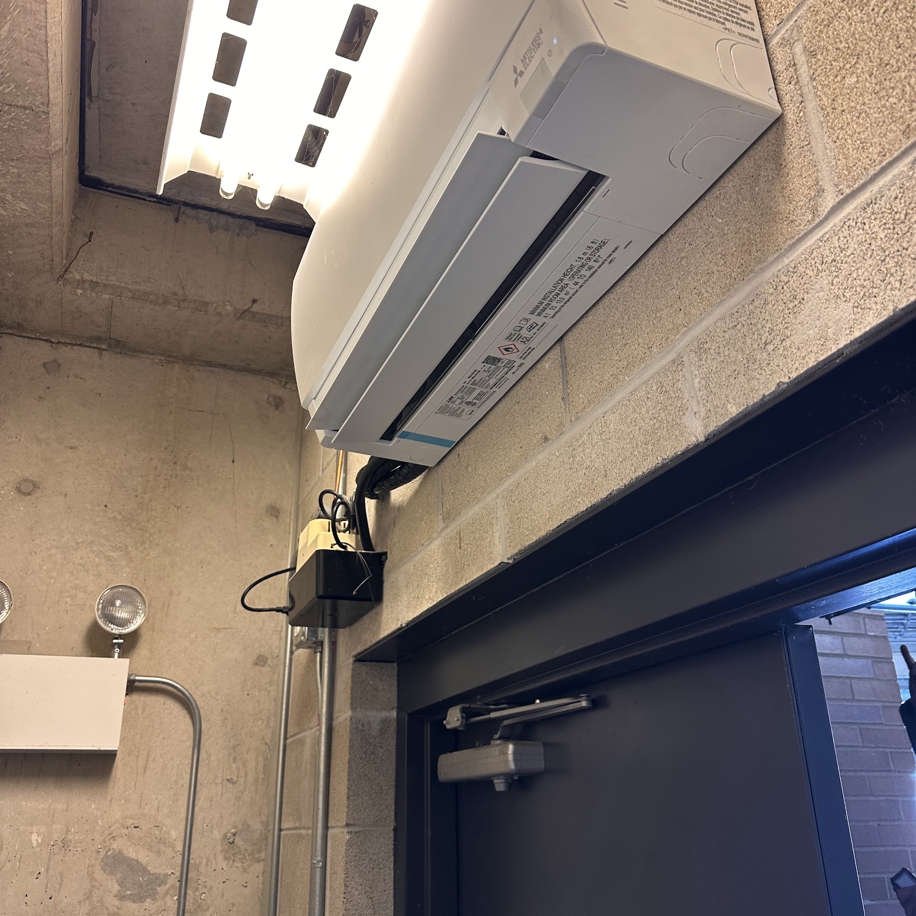 Clean professional installation of a ductless mini-split shows Oasis Heating and Cooling’s reliable workmanship and attention to detail.