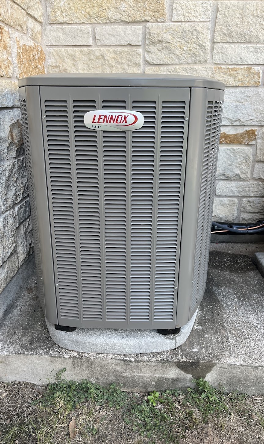 A clean Lennox outdoor condenser professionally installed on a solid pad, demonstrating the reliable workmanship customers expect from Abacus Plumbing, Air Conditioning, & Electrical.