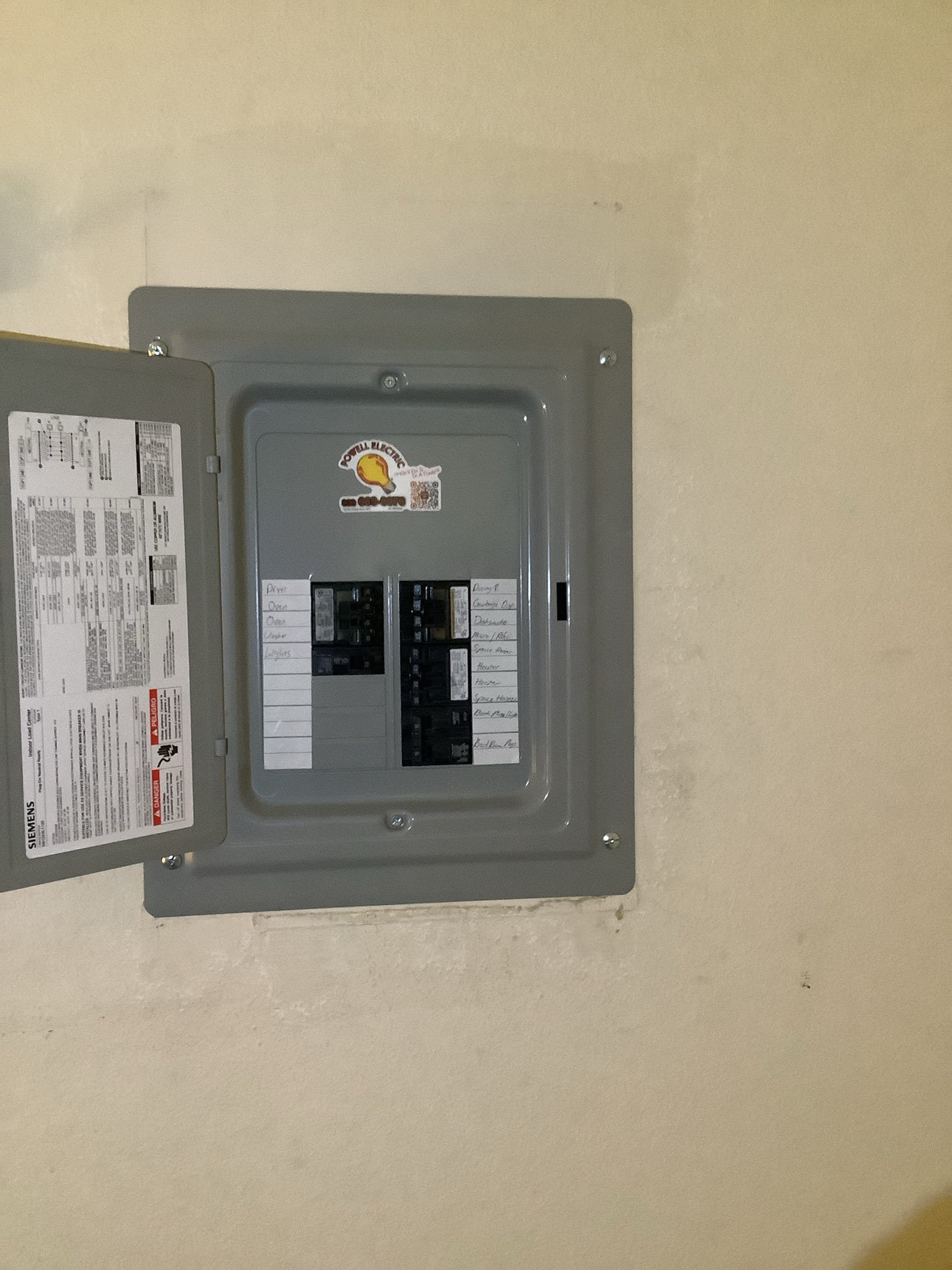 Powell Electric shows dependable, tidy electrical work with clearly labeled breakers for homeowner safety and easy future service.