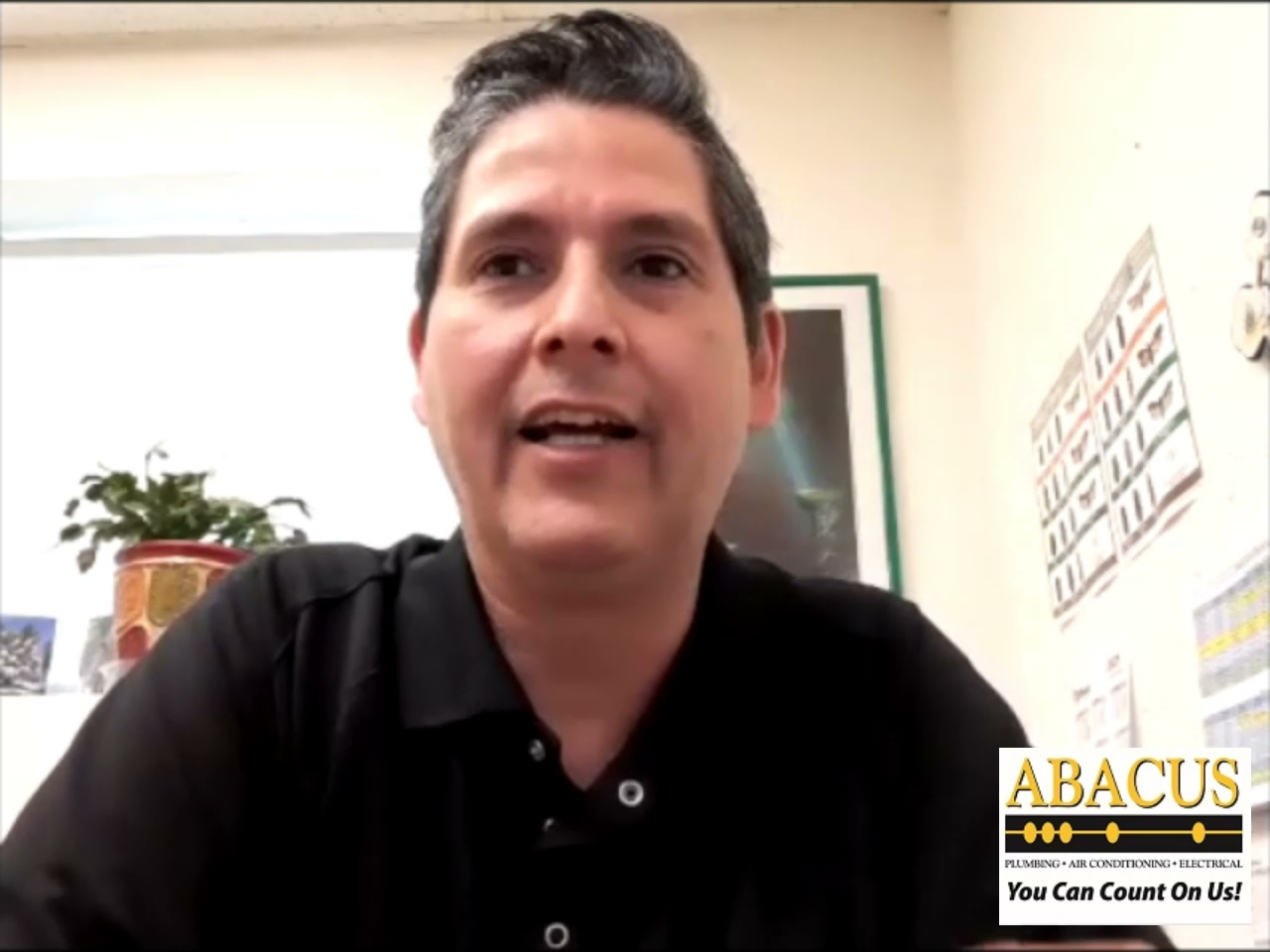 A friendly team member highlights Abacus Plumbing, Air Conditioning & Electrical's reliable, customer-focused service and professional approach.