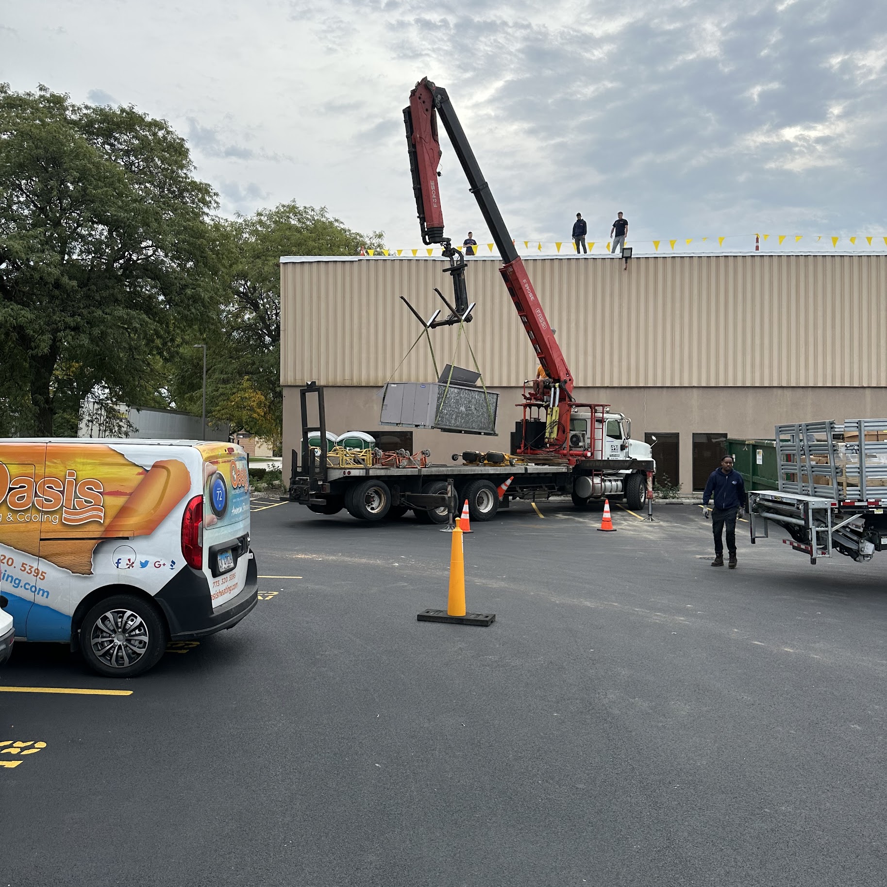 Our team safely installs rooftop equipment with precision and care, showcasing Oasis Heating and Cooling’s commitment to dependable service.