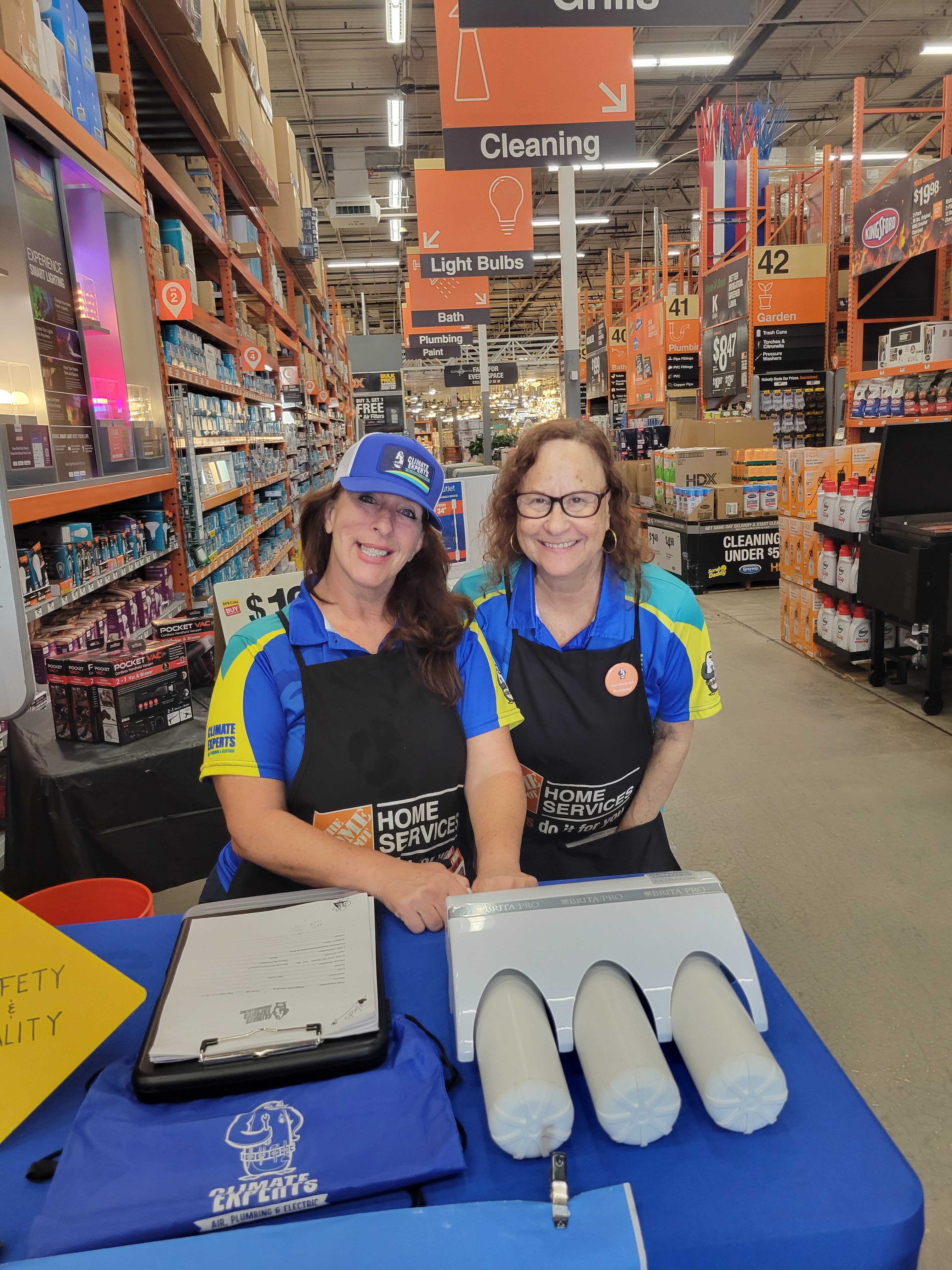 Friendly, professional representatives from Climate Experts Air, Plumbing & Electric showcase helpful service and reliable expertise to shoppers in-store.
