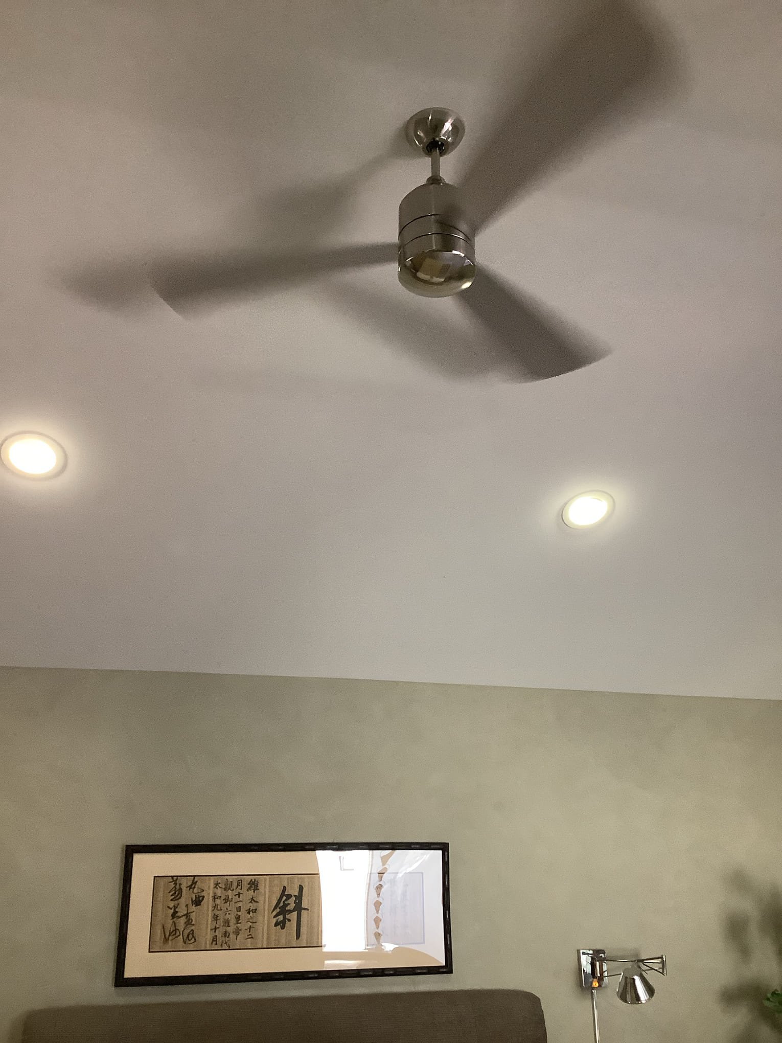 A polished, tidy ceiling fan and recessed lighting installation show Powell Electric's commitment to craftsmanship and dependable results.